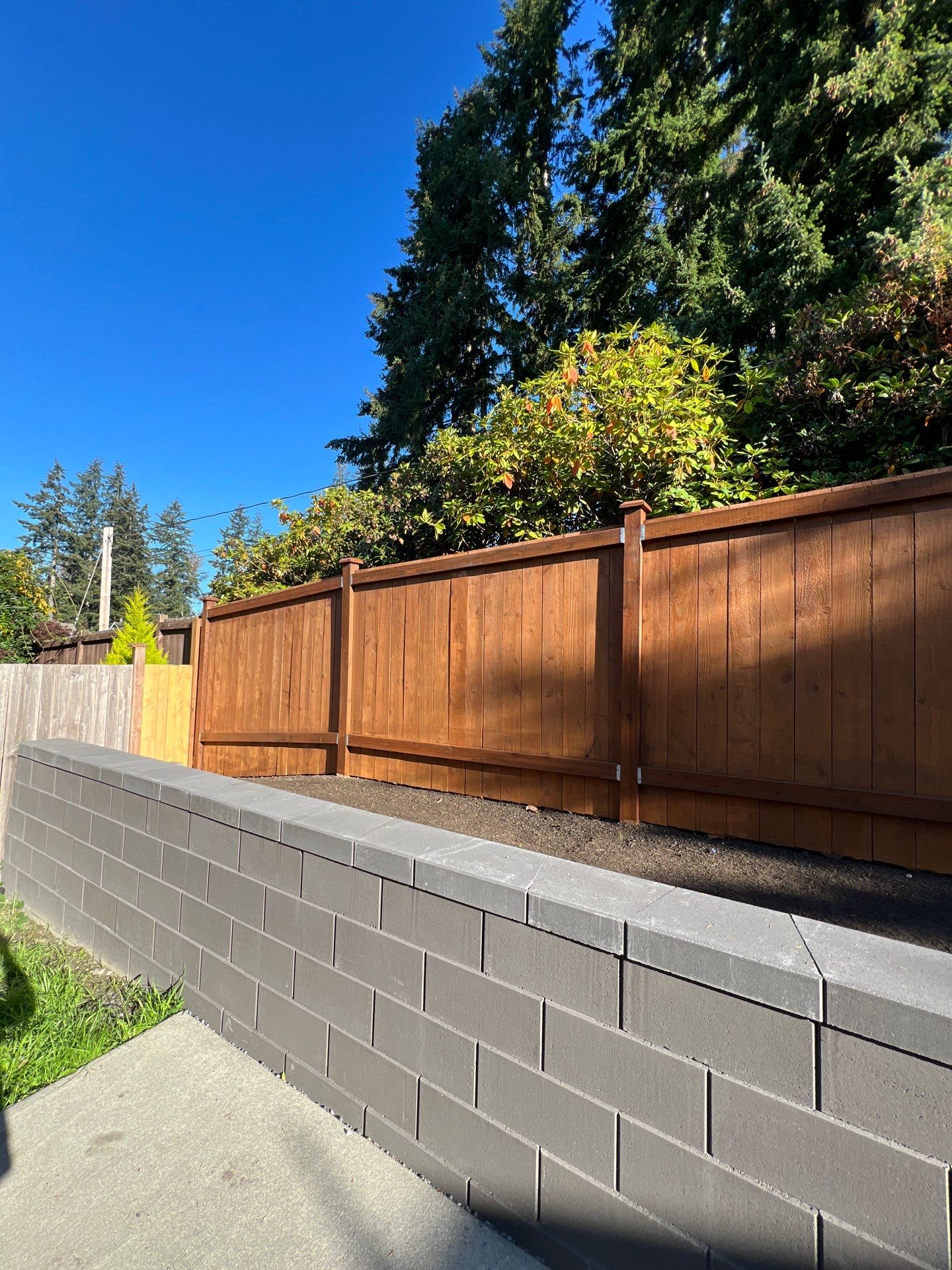 Jireh Outdoor Projects | Retaining Wall & Fence Build by Jireh Asphalt & Concrete Inc 
