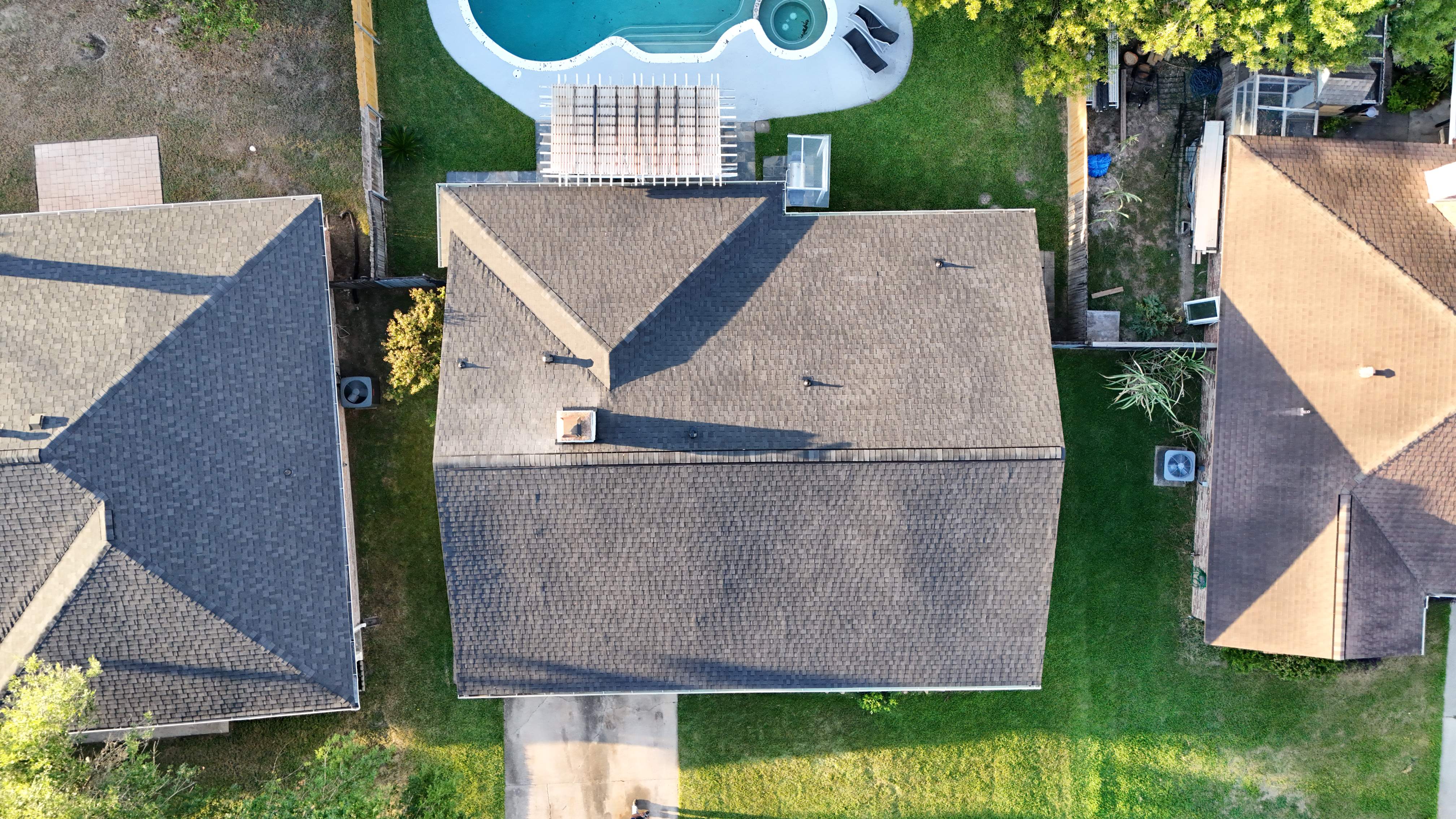Poolside Roof Replacement in Smoky Gray — Houston, TX by PL Roofing & SB Roofing, LLC.