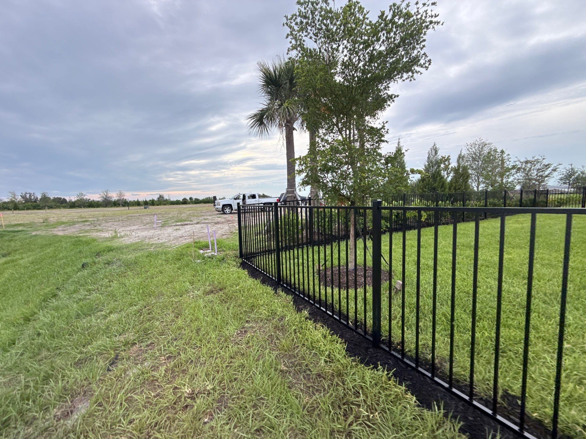 Black Aluminum Picket Fence Installation in Venice, Florida by True Fence LLC