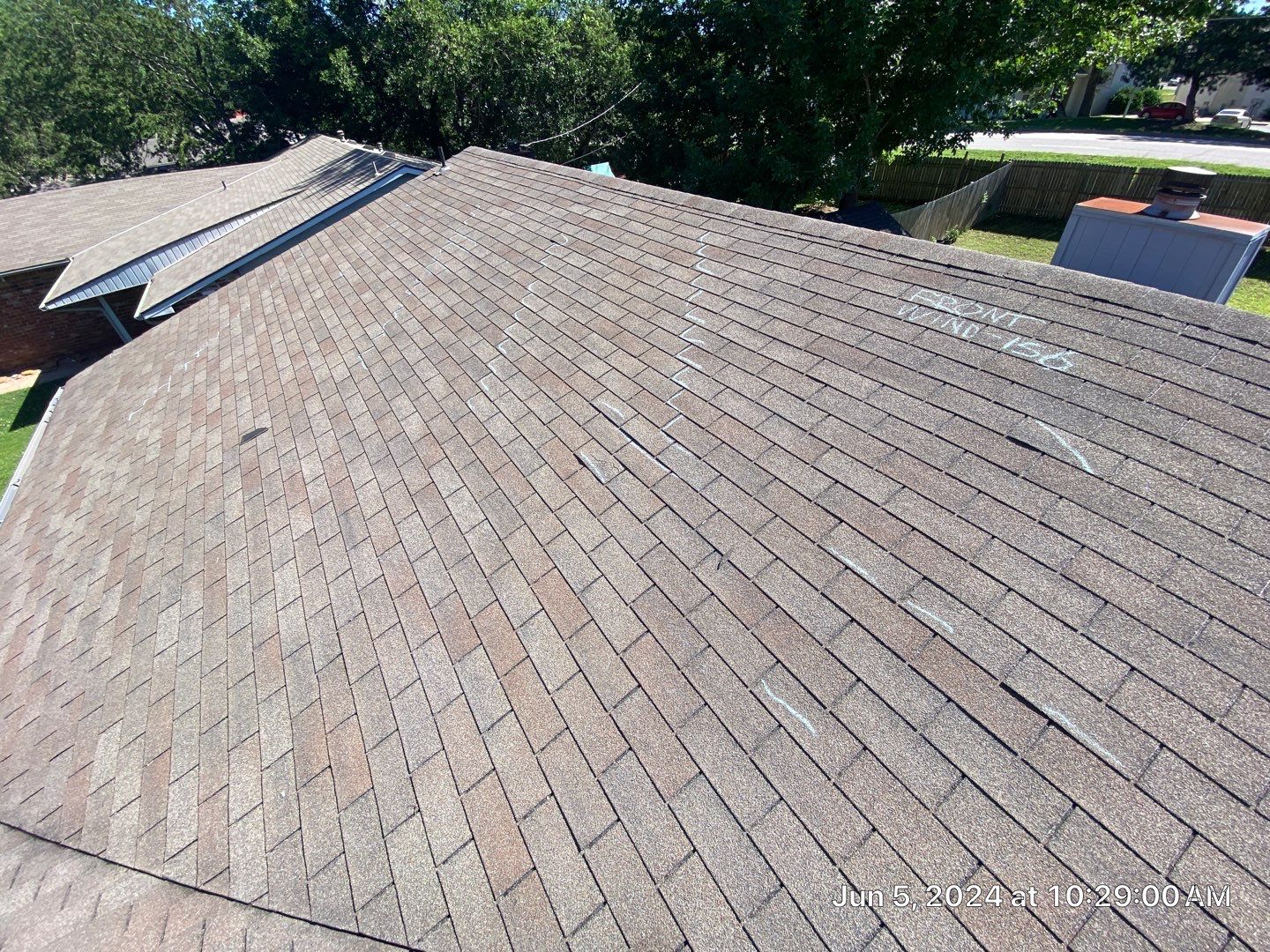 Roof inspection in Bartlesville by Decor Roofing & Restoration