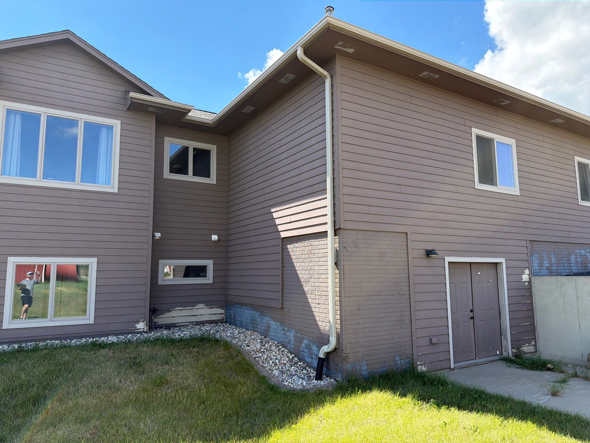 Full Exterior Siding Paint Restoration and Refresh in Garretson by Select Painting, Coatings & Garage Cabinets