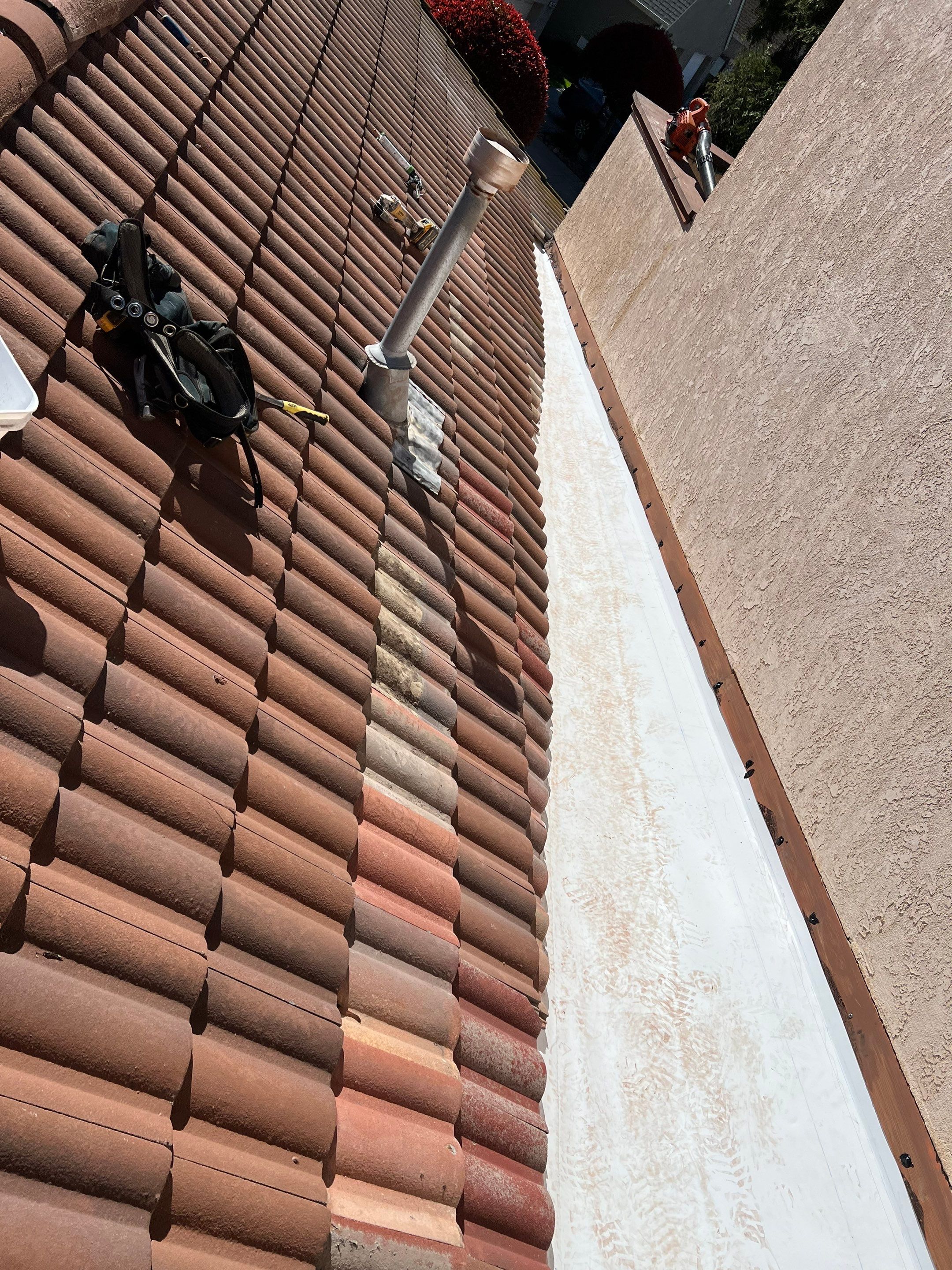 Tile Roof repair by Grandmark Service Company