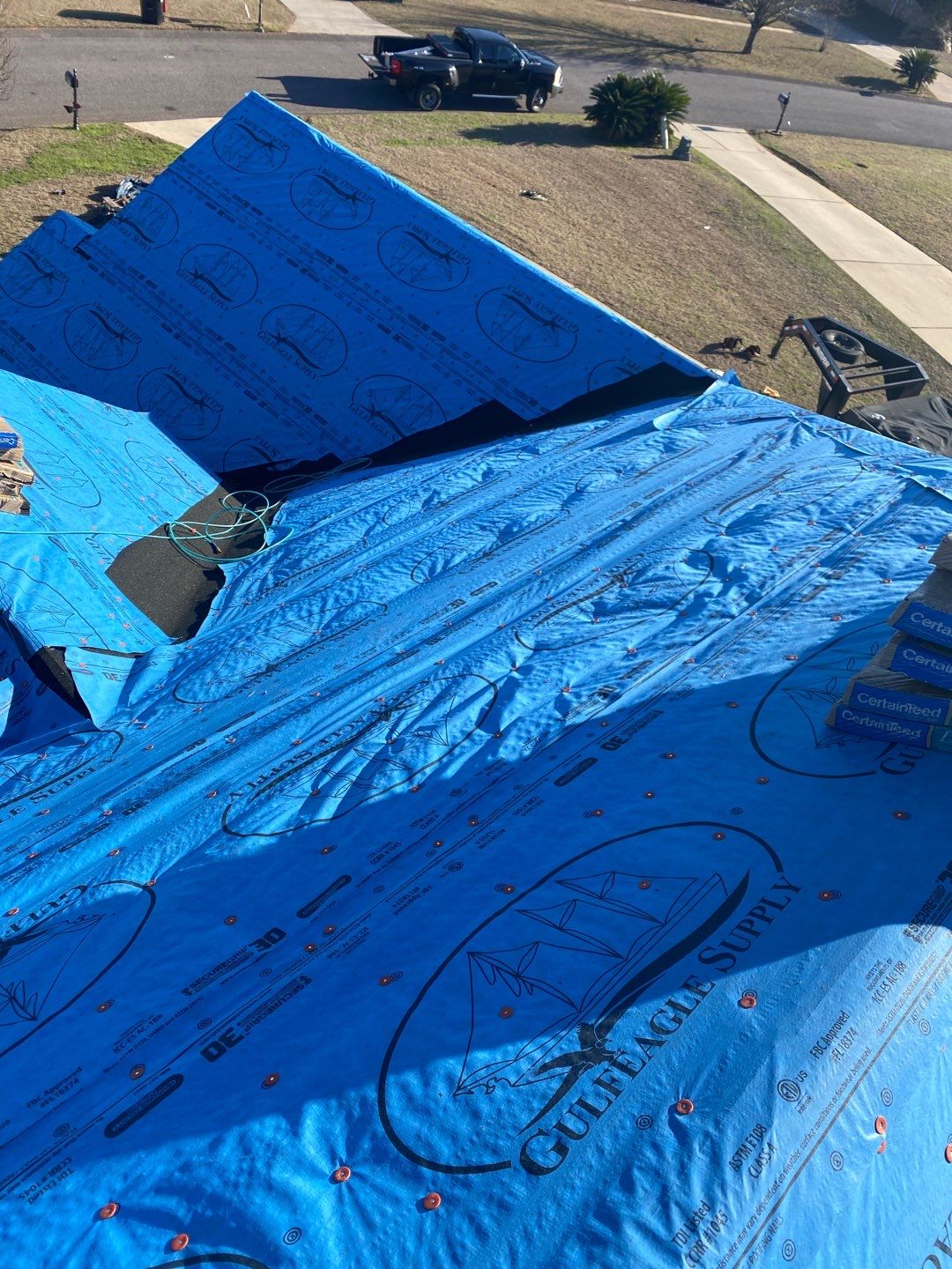 Residential Roofing Installation using Roof Replacement by American Roofing & Construction LLC