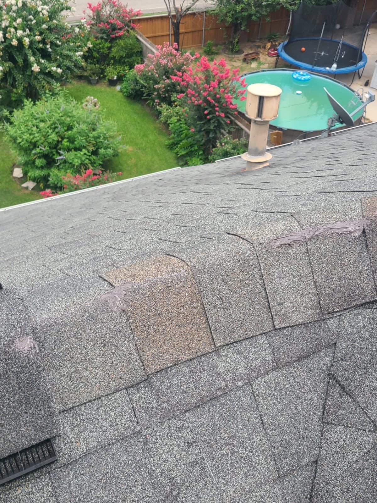 Hail Damage using Owen's Corning Duration (Lifetime) Shingles by Roof Repair Company