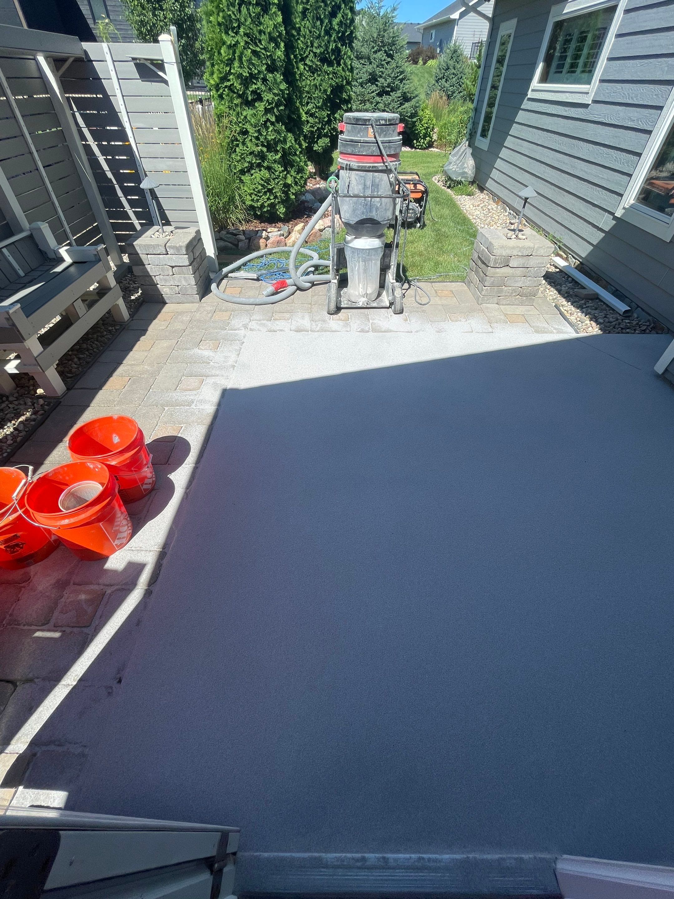 Concrete Patio Coating with Fuzzy Wool Finish in Sioux Falls by Select Painting, Coatings & Garage Cabinets