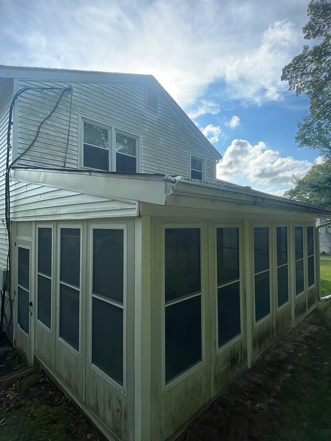 House Wash & Roof SoftWash (rear four season room) by SJ Exterior