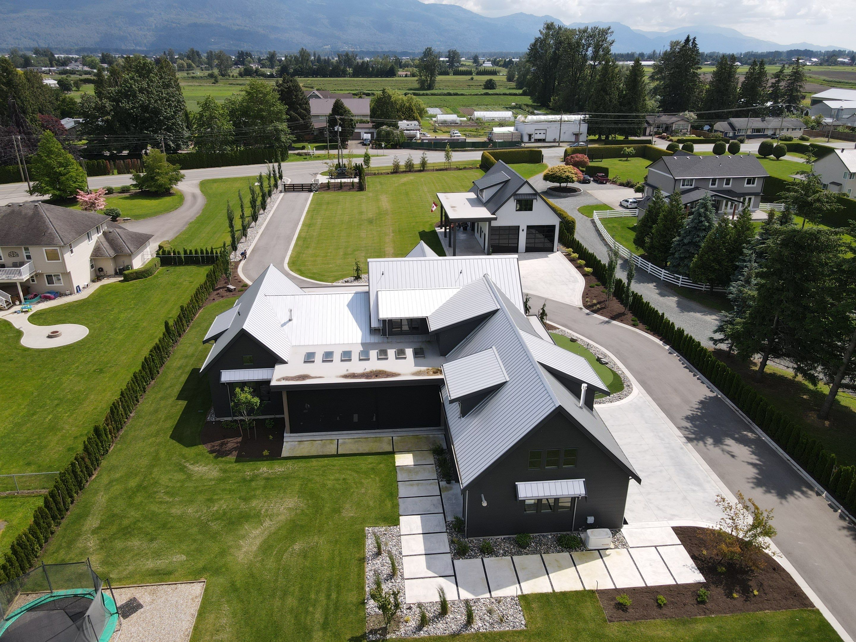 Residential Roofing Installation using 12" Prolok metal  by Top Notch Roofing Inc