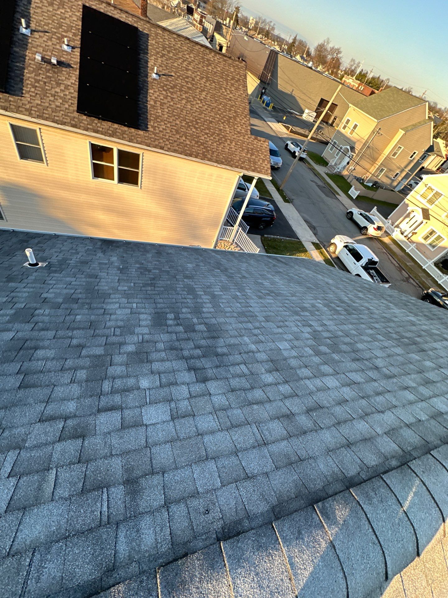 Charcoal Shingles by Reimagine Roofing