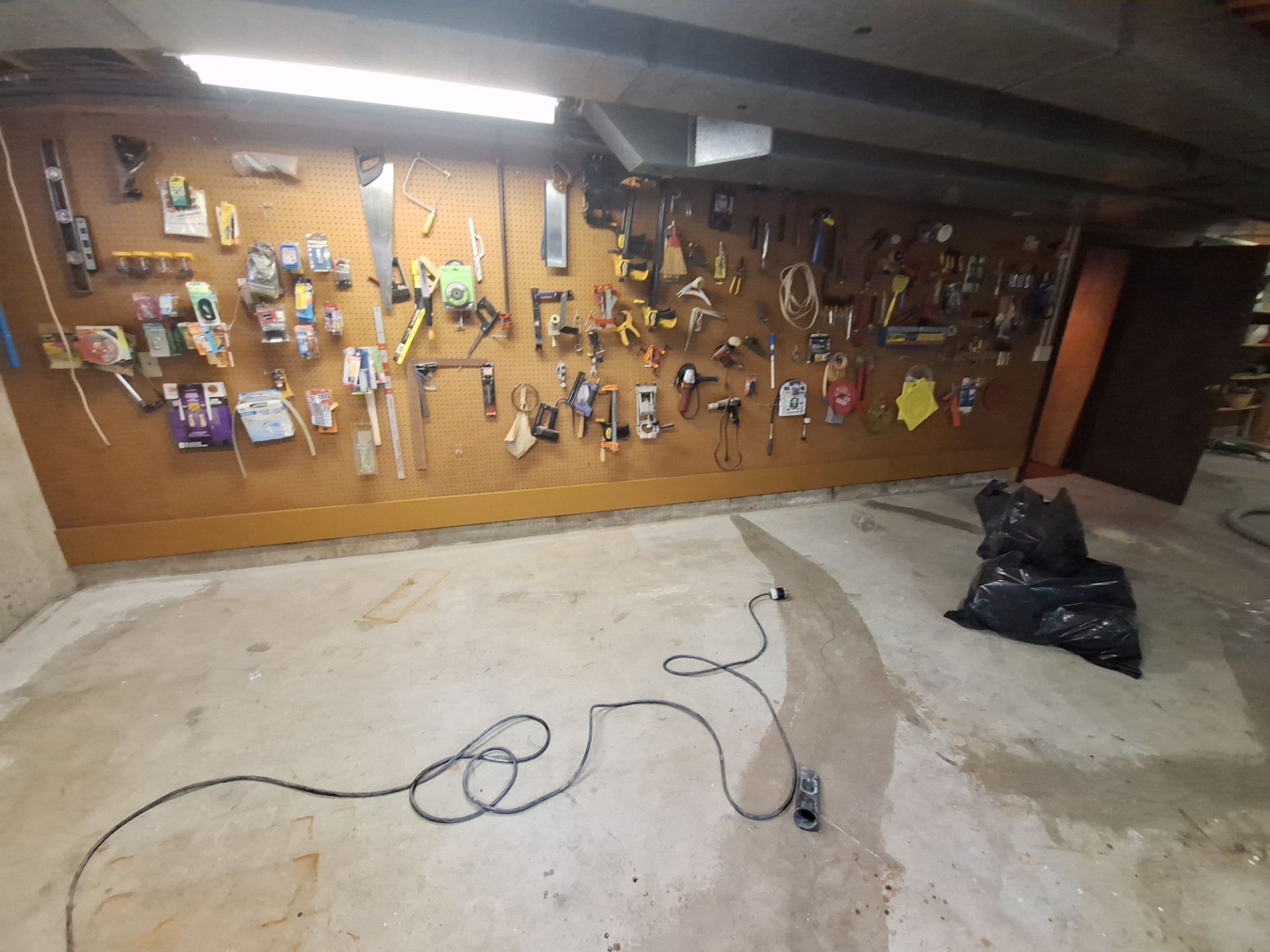 Full Basement and Garage Epoxy Flake Floor Installation in North Muskegon by Gordon Painting