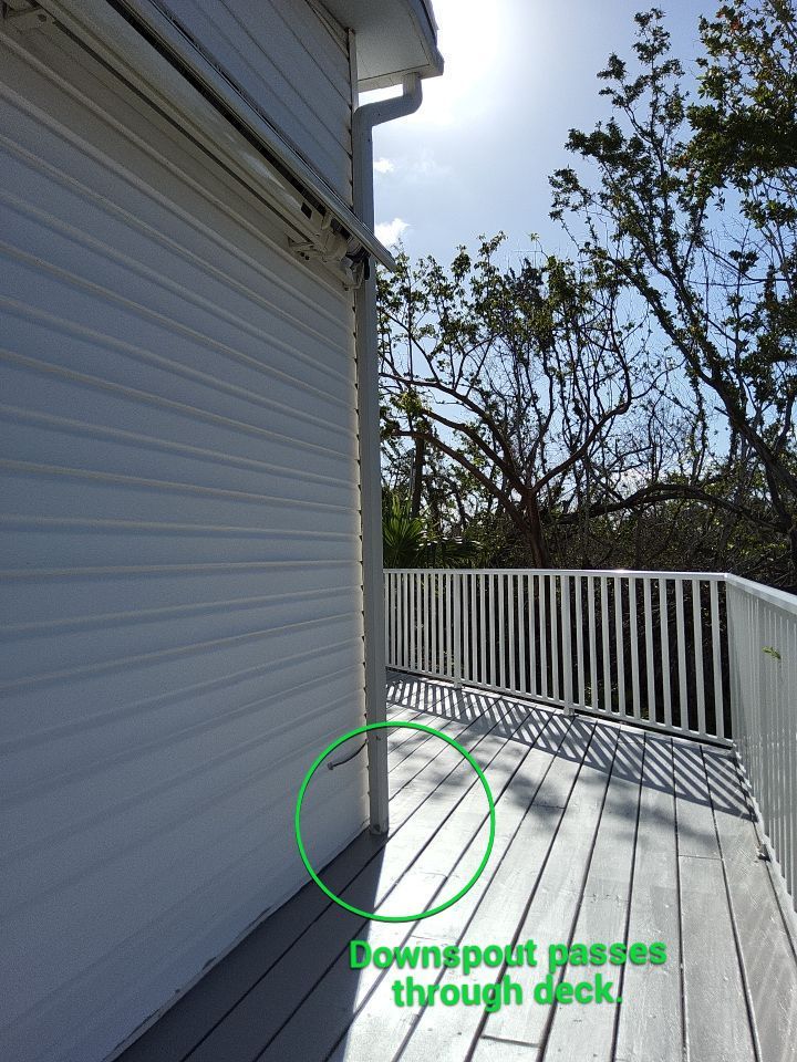 Downspout Installation using Charcoal Grey in Sanibel FL by Gutter Professors