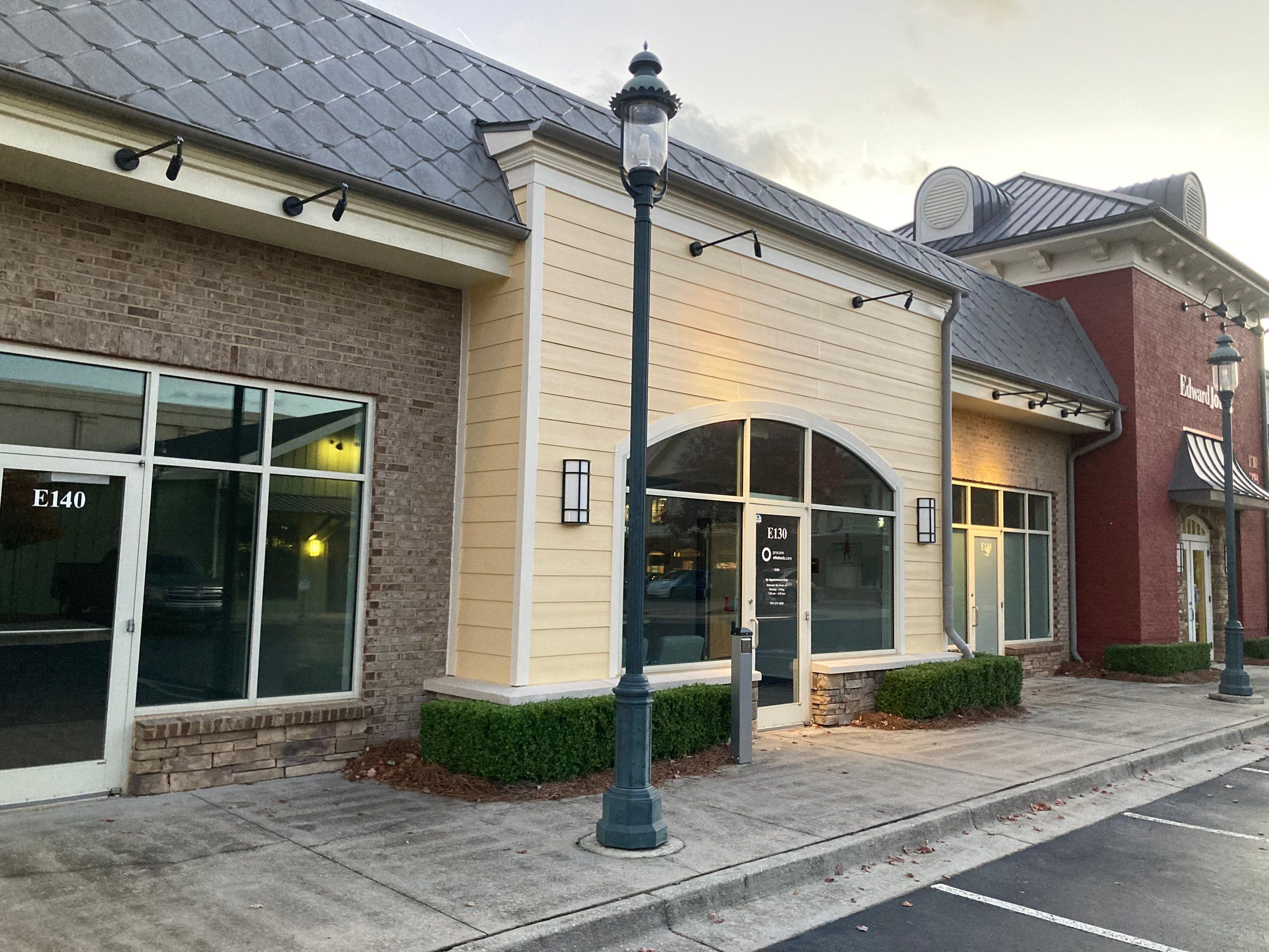 Commercial Exterior & Stairwell Painting – Corner Market by Praise God Painting, LLC