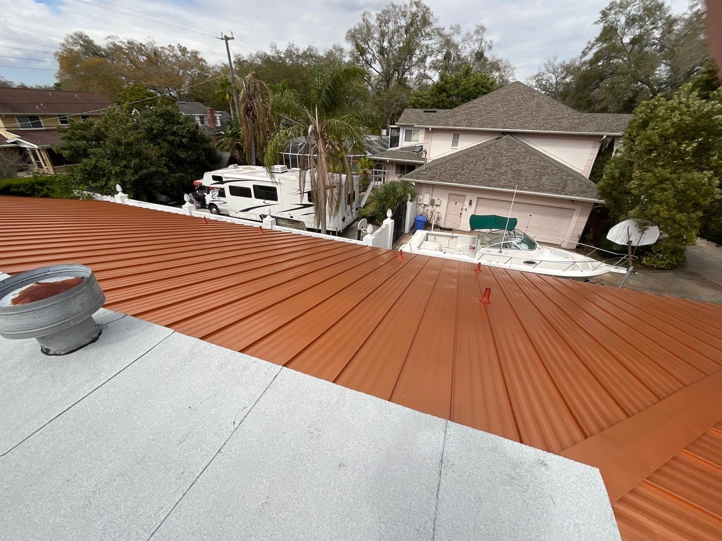 Residential Re-Roof using MS Metals, Copper Penny, Standing Seam. by First Due Roofing