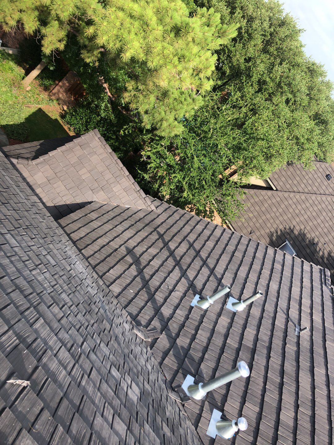 Designer Residential Roof with Zip System by Springtree Restoration