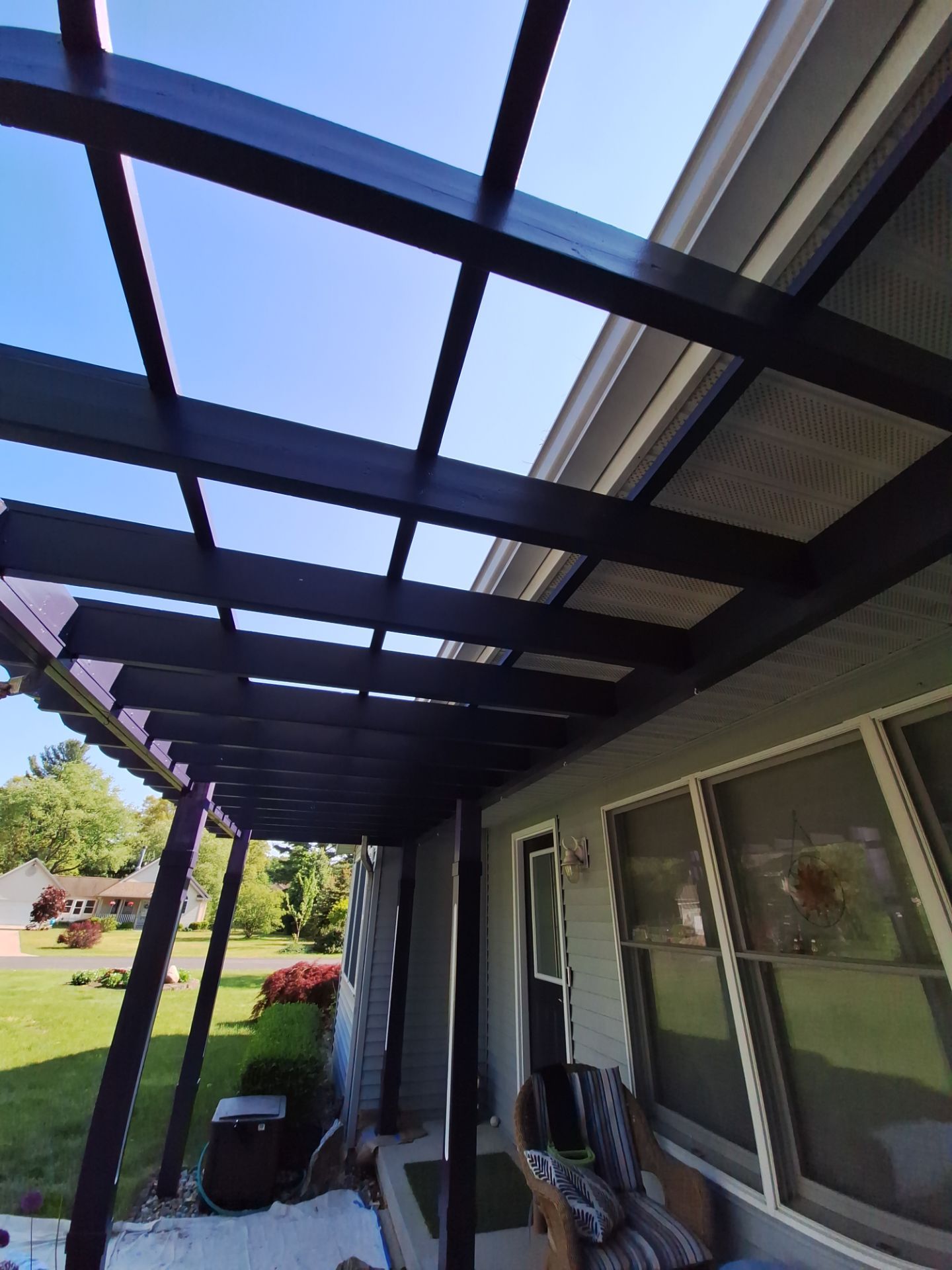 Repaint bedroom furniture, Pergola, and doors. Stain decking by Gordon Painting