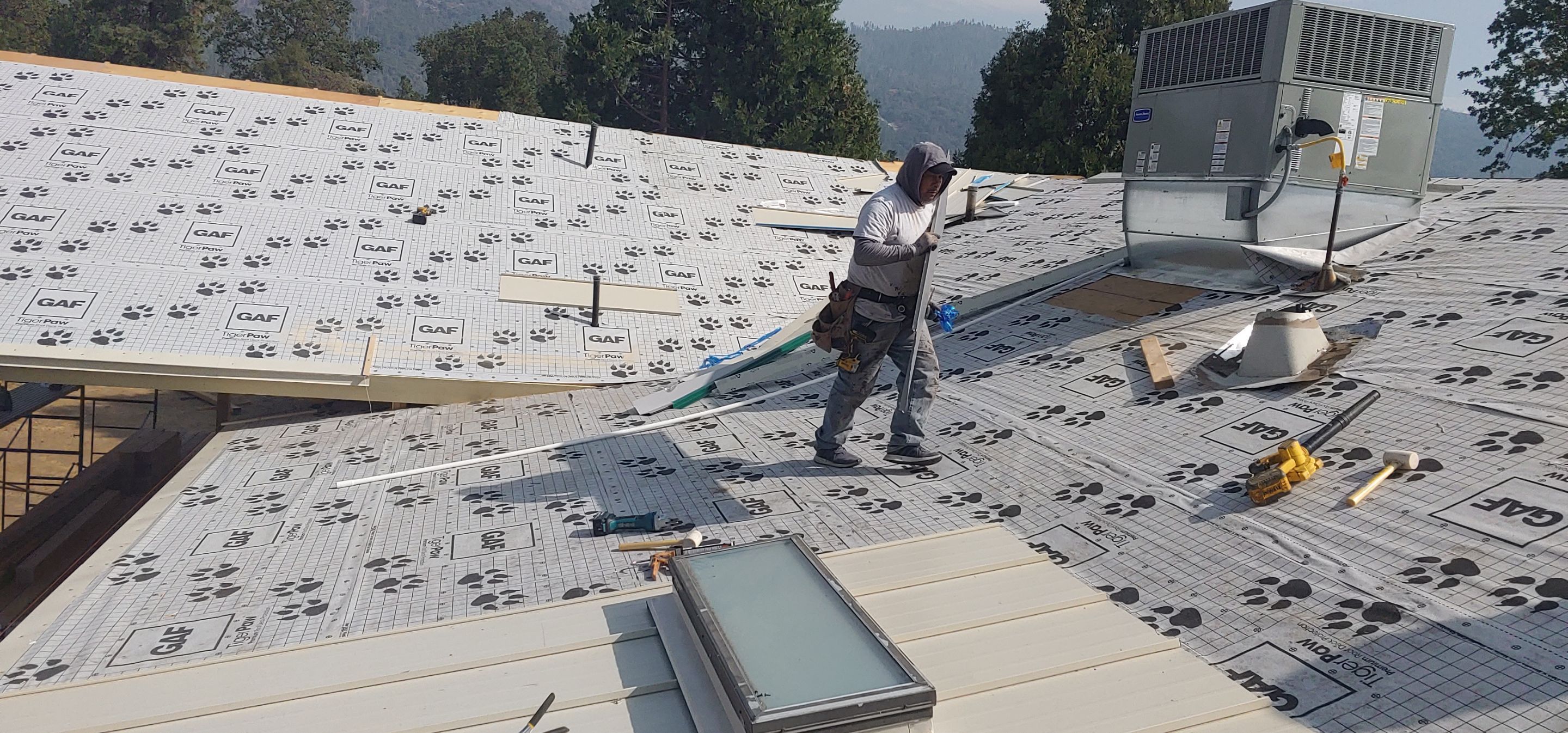 Residential Roofing Installation using Standing seam metal roofing system by Straight Edge Roofing Inc