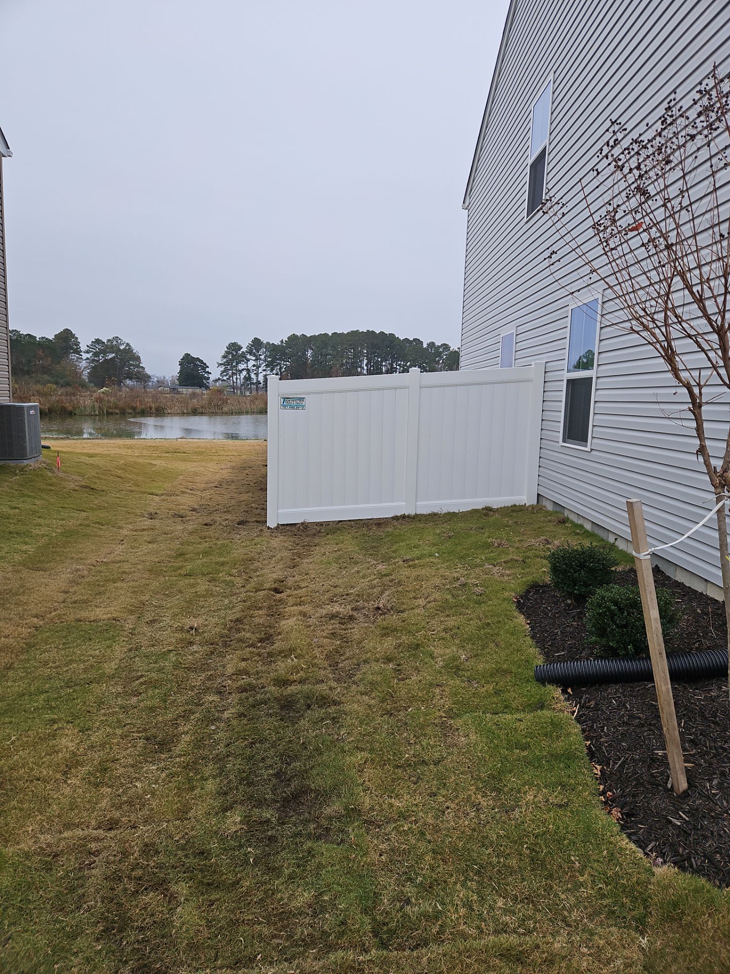 A Perfect Fence for a Brand-New Home by Tidewater Fence