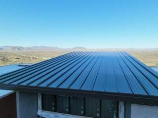Dark Bronze Standing Seam by Reimagine Roofing