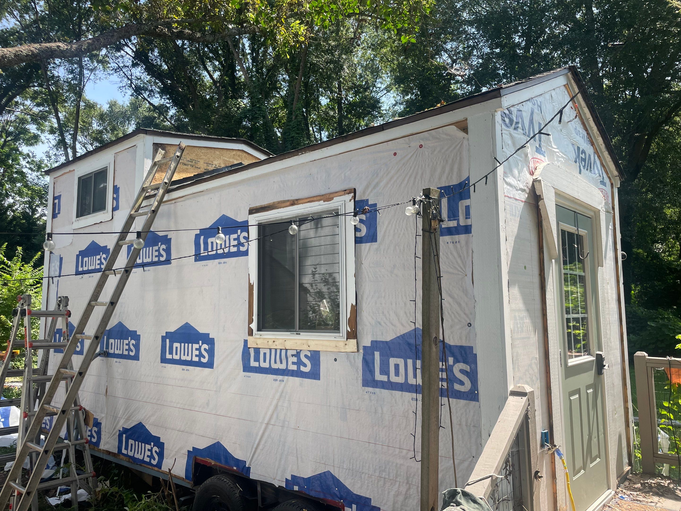 tiny home remodel- siding,paint,roofing by Nailed It Roofing & Remodeling LLC