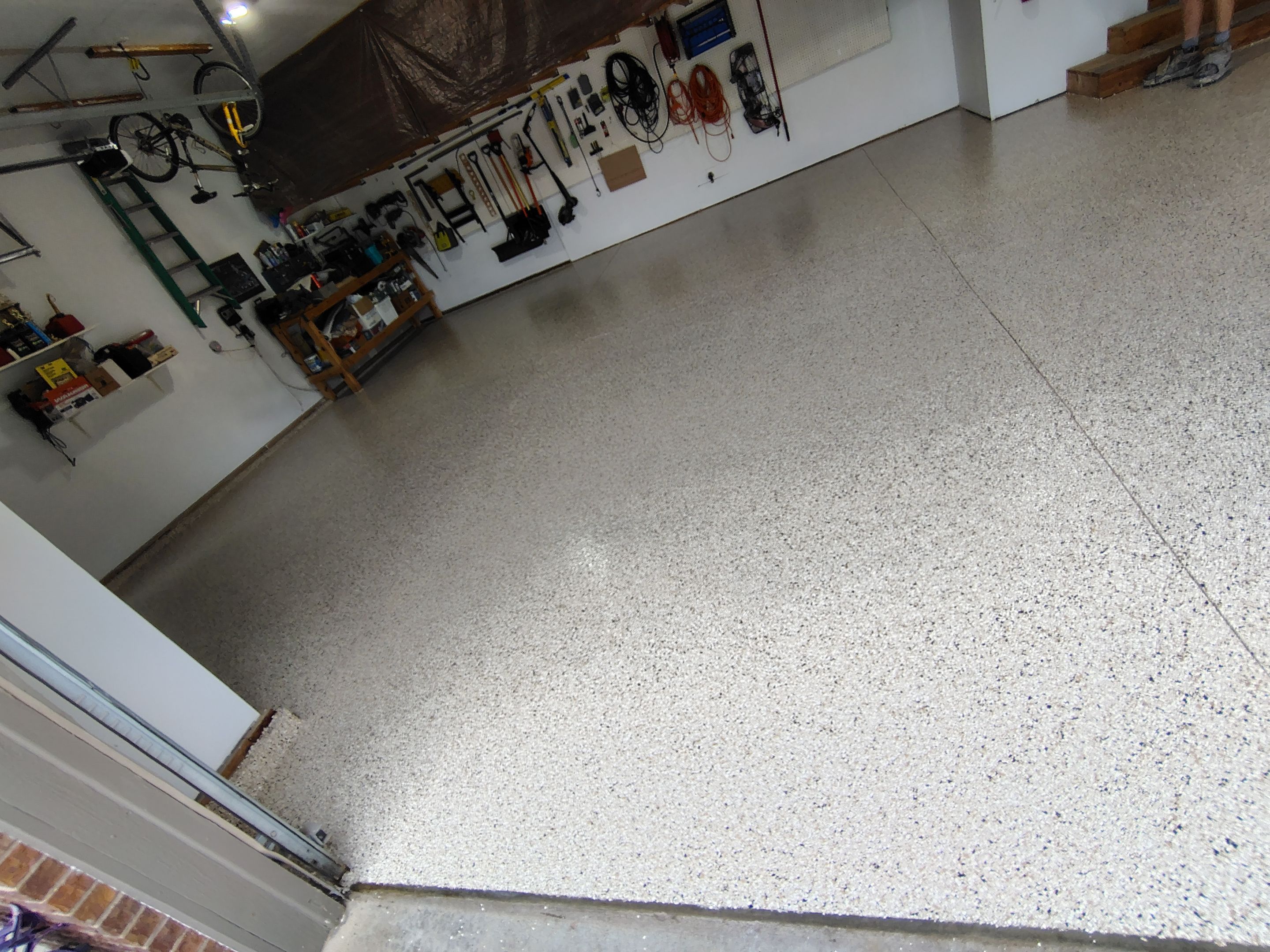 Durable Garage Floor Coating in Brandon by Select Painting, Coatings & Garage Cabinets