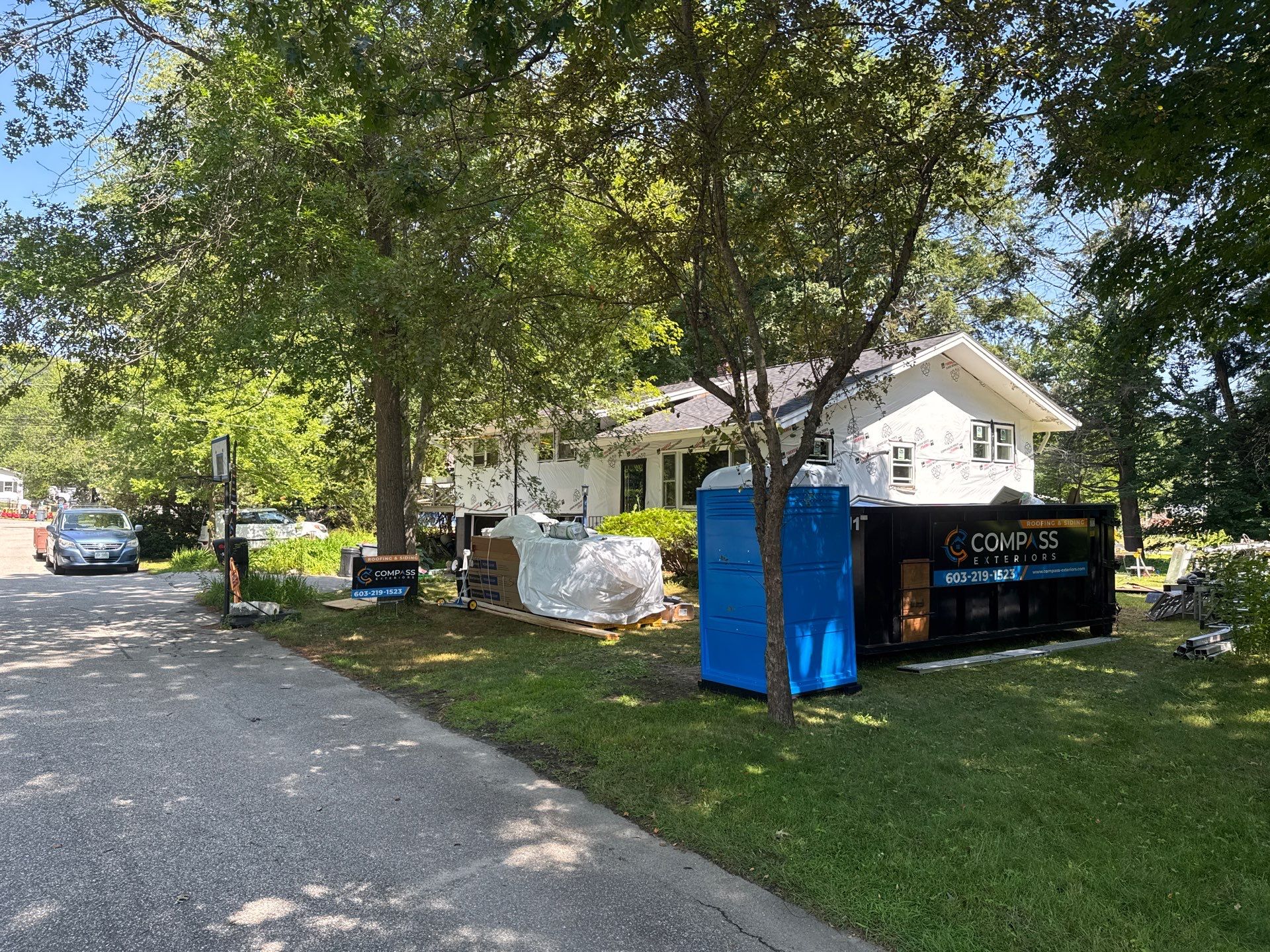 Full Vinyl Siding, Window & Door Replacement Near the Bellamy River in Dover, NH by Compass exteriors