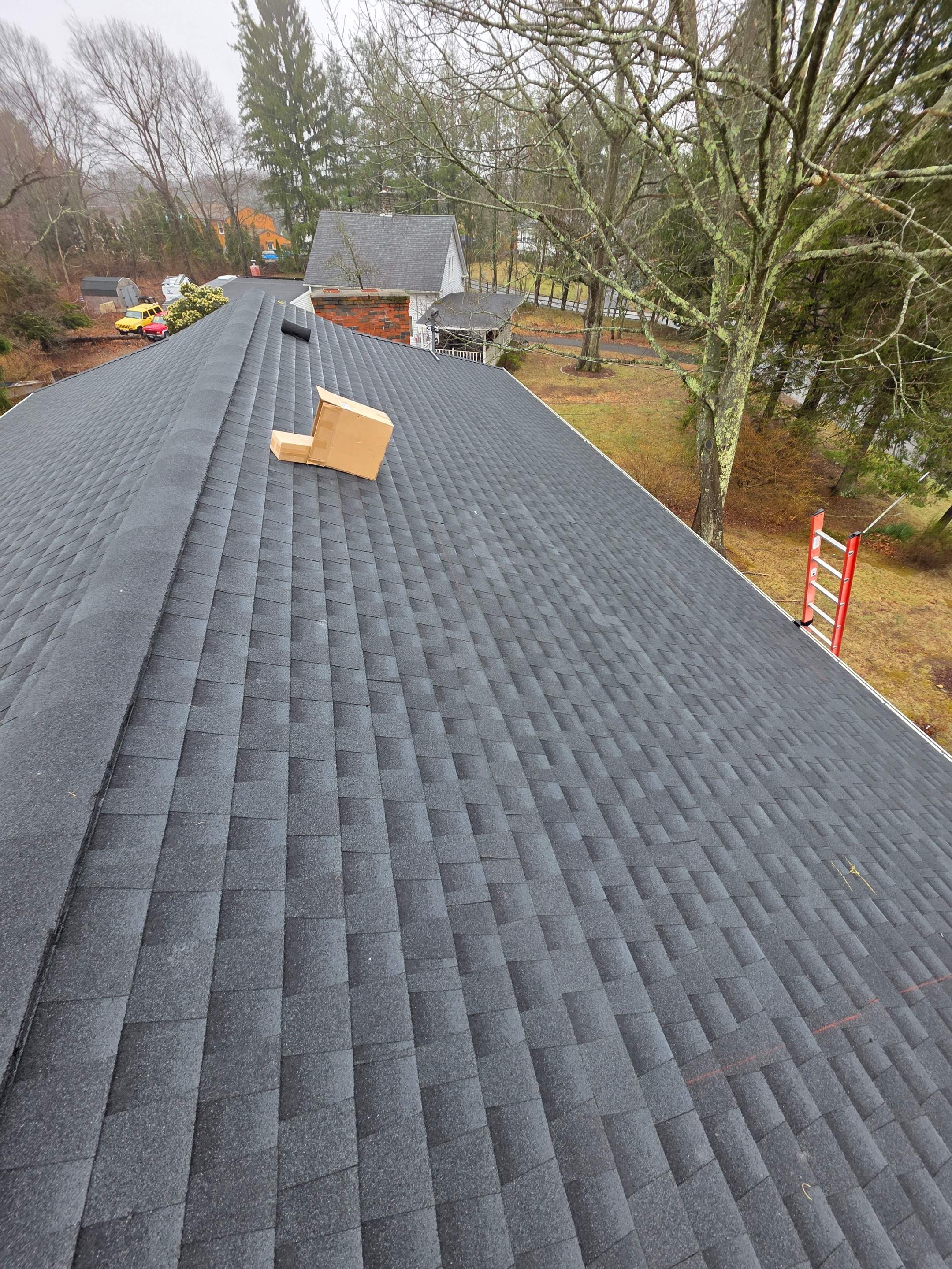 Estate Gray Shingles by Reimagine Roofing