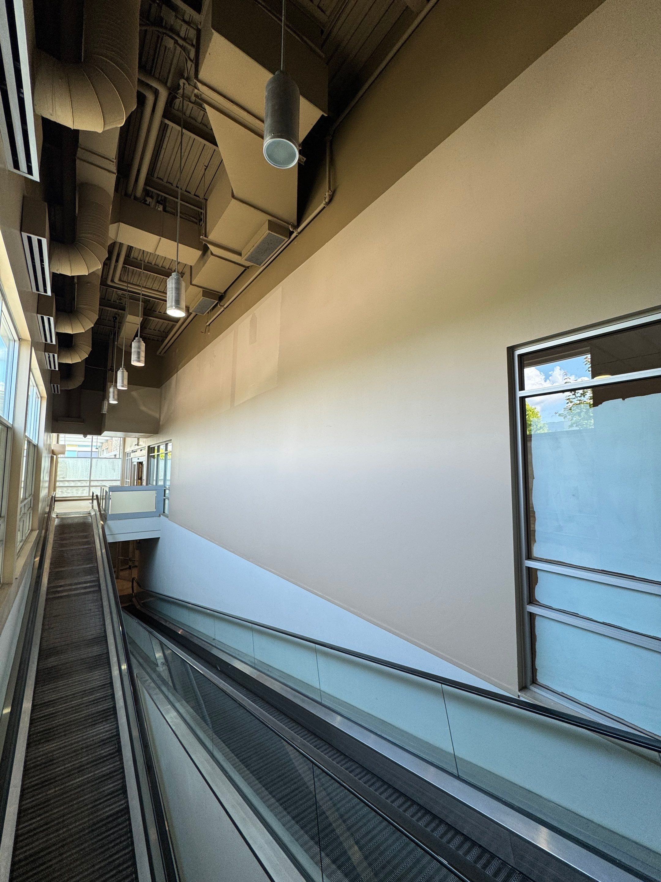 Commercial Prime & Paint Project-30ft height by YVR Construction Group