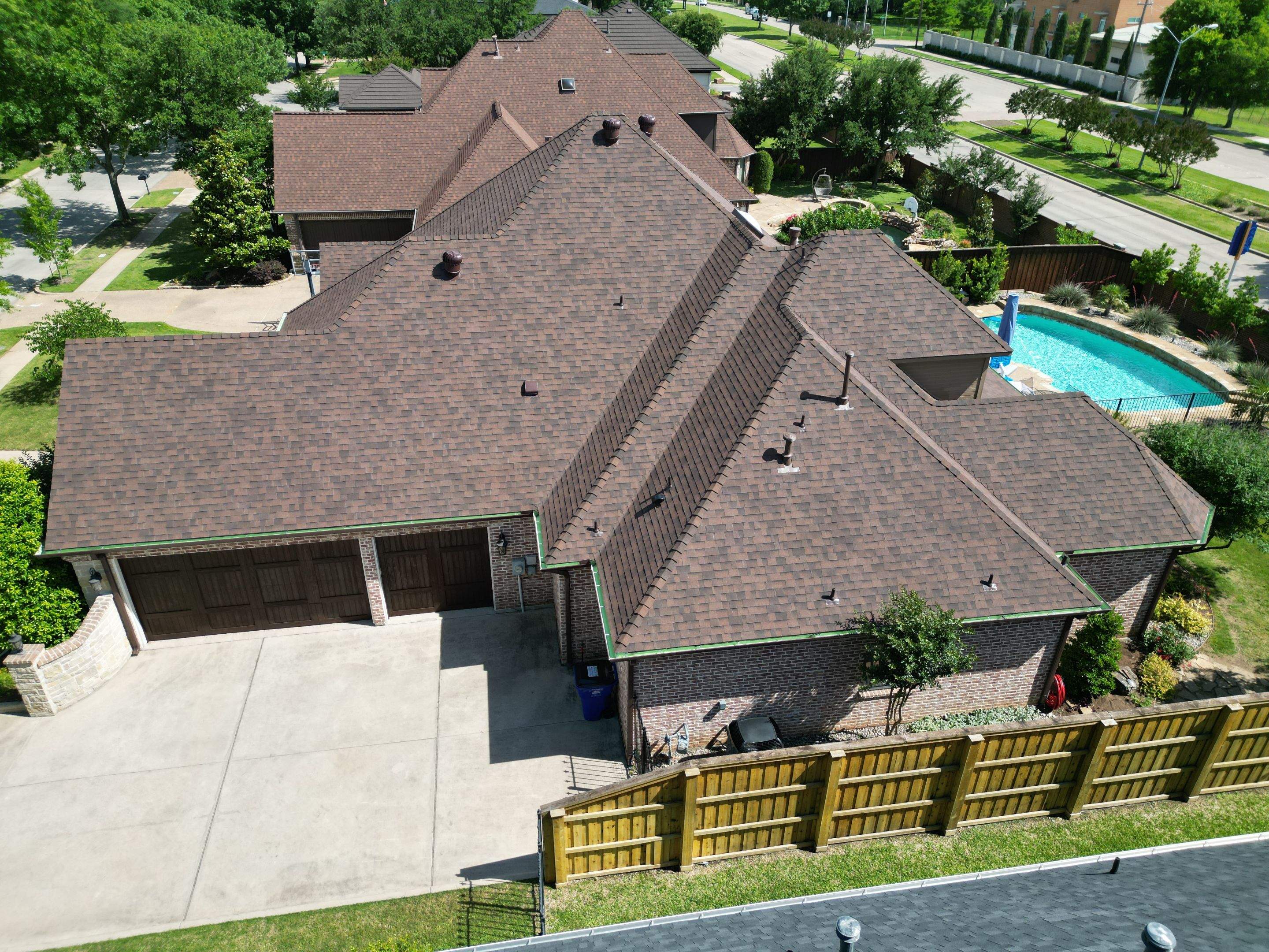 Residential Roofing Installation using Malarkey Legacy Scotchgard Shingles by Harvey Roofing & Construction