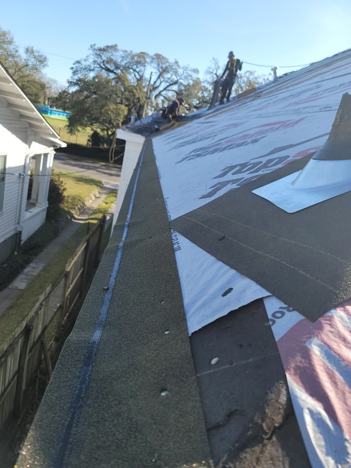 Residential Roofing Installation using Roof Replacement by American Roofing & Construction LLC