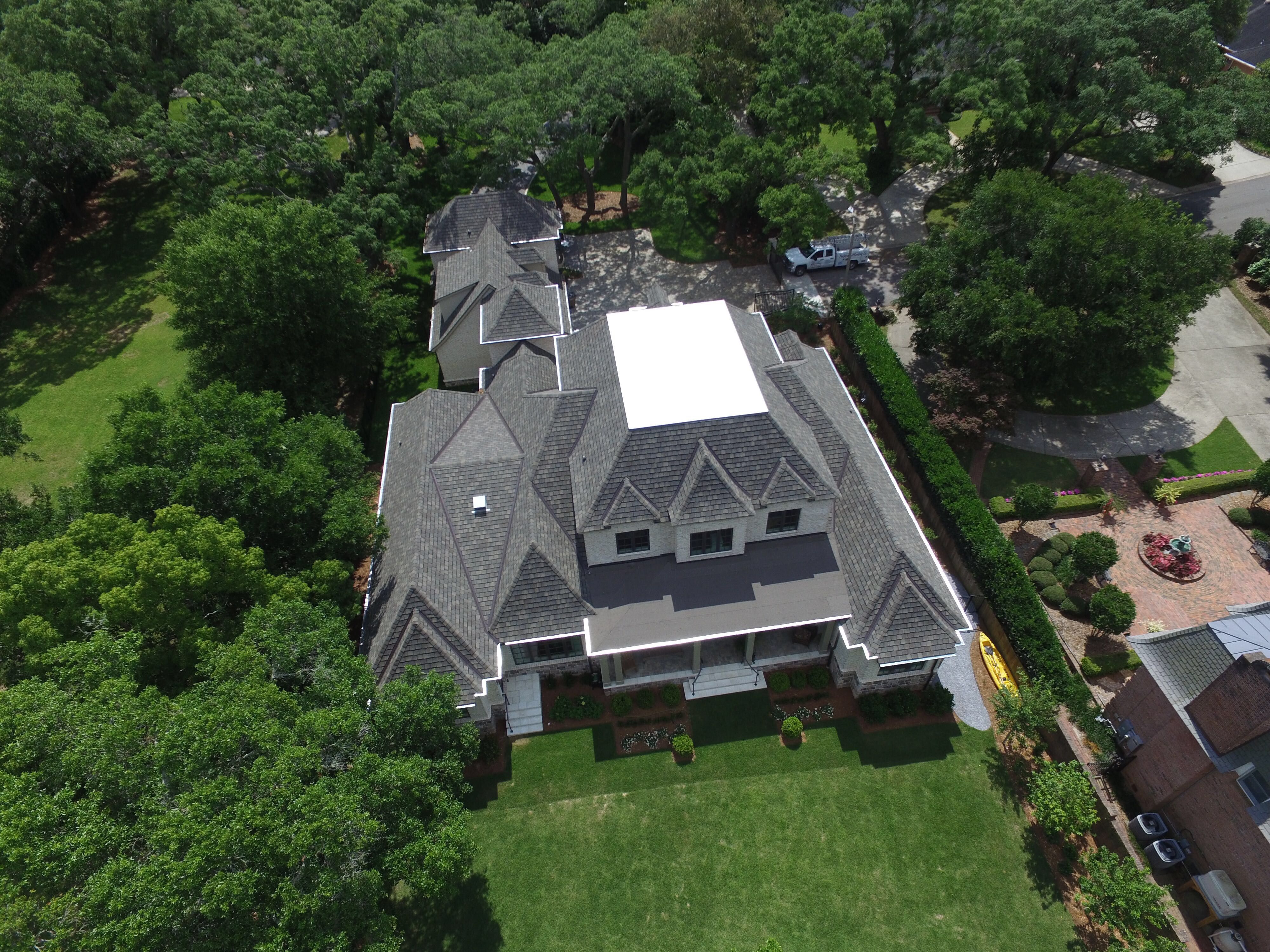 Designer Shingle Roof  by Professional Roofing Company