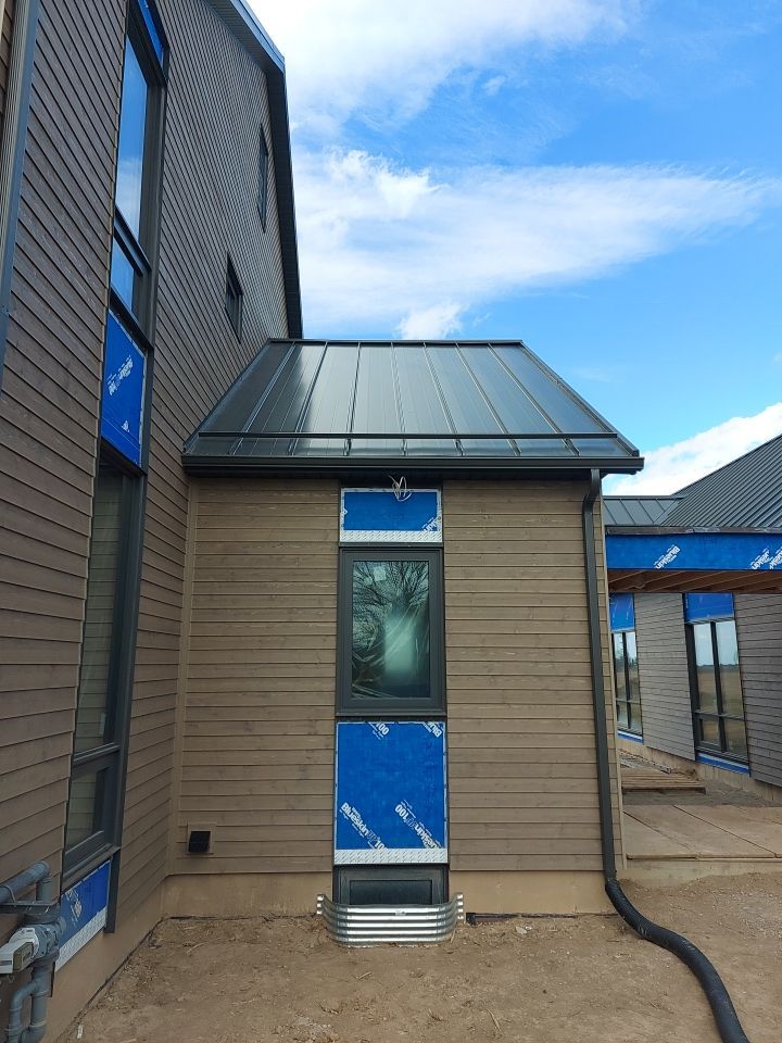 New Home Construction using 16" Standing Seam Panels by Jay Carter Roofing & Sheet Metal