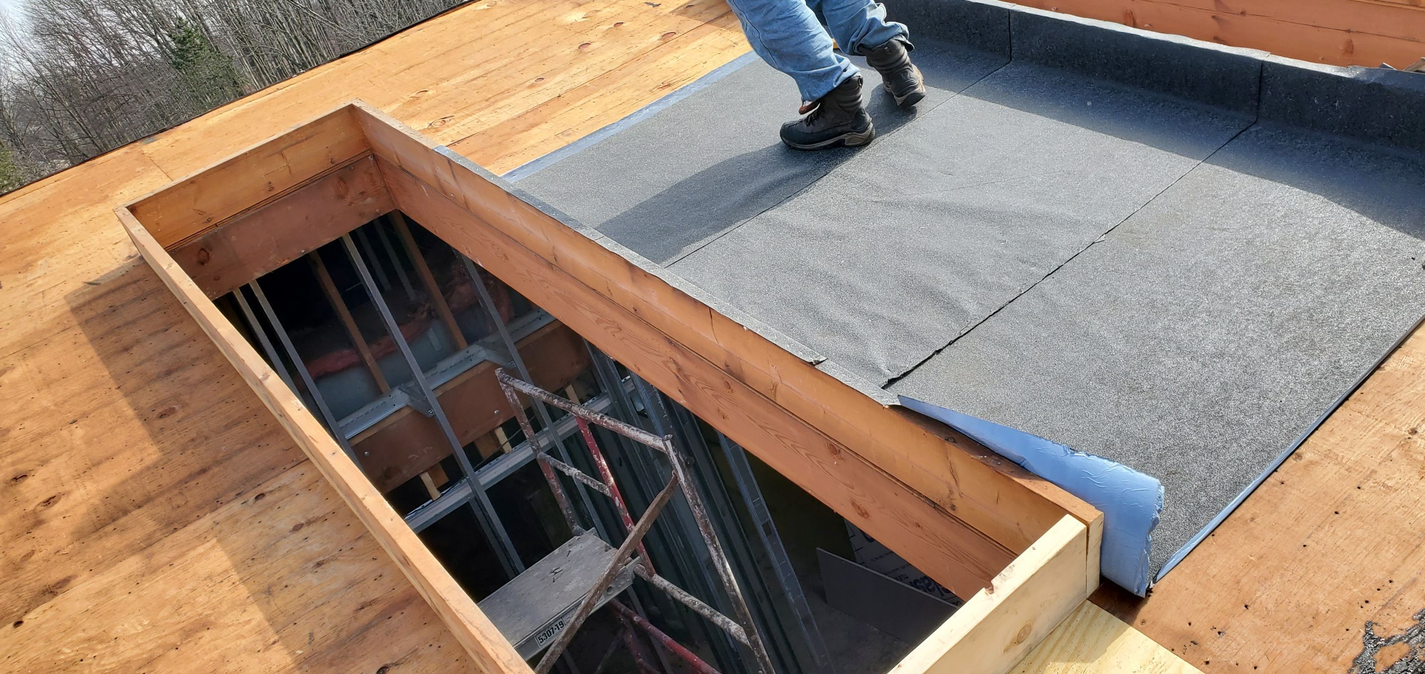 Skylight removal and install  by Absolute Roofing and Construction