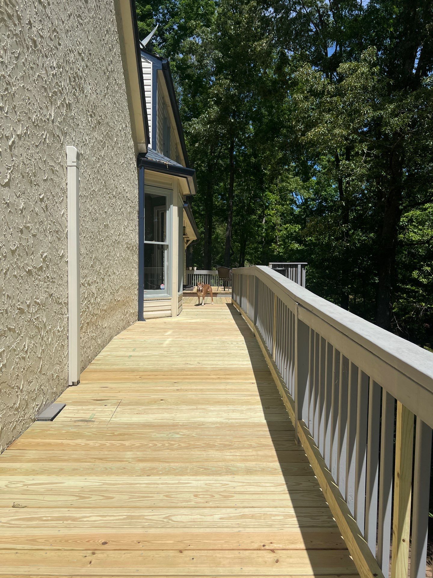 Pressure-Treated Wood Deck Resurfacing and Staircase Reconstruction in Canton by Swift Home Renovations