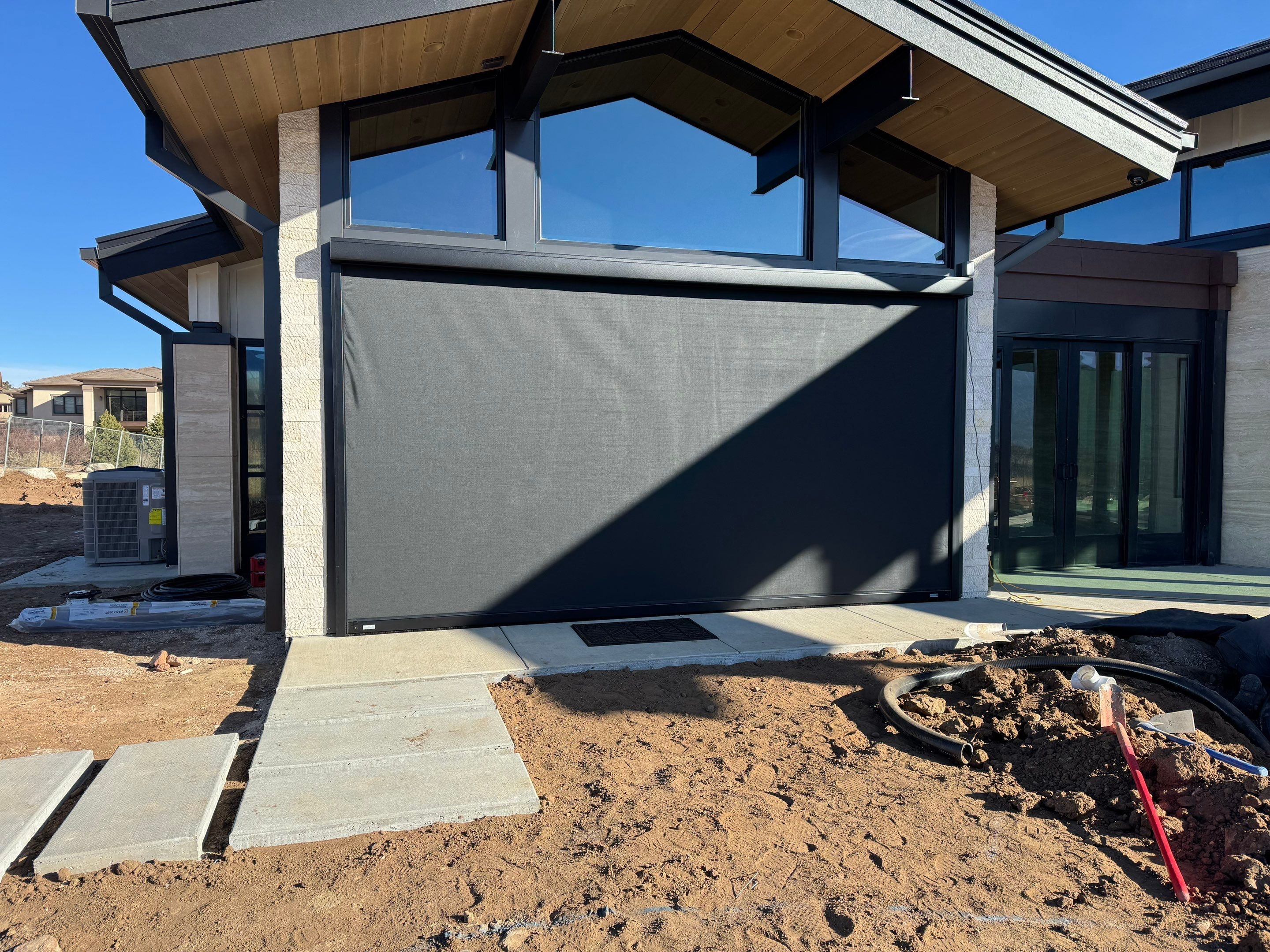 Exterior All-Weather MagnaTrack Screens Installation using Progressive MagnaTrack Screens by Outdoor Solutions Colorado