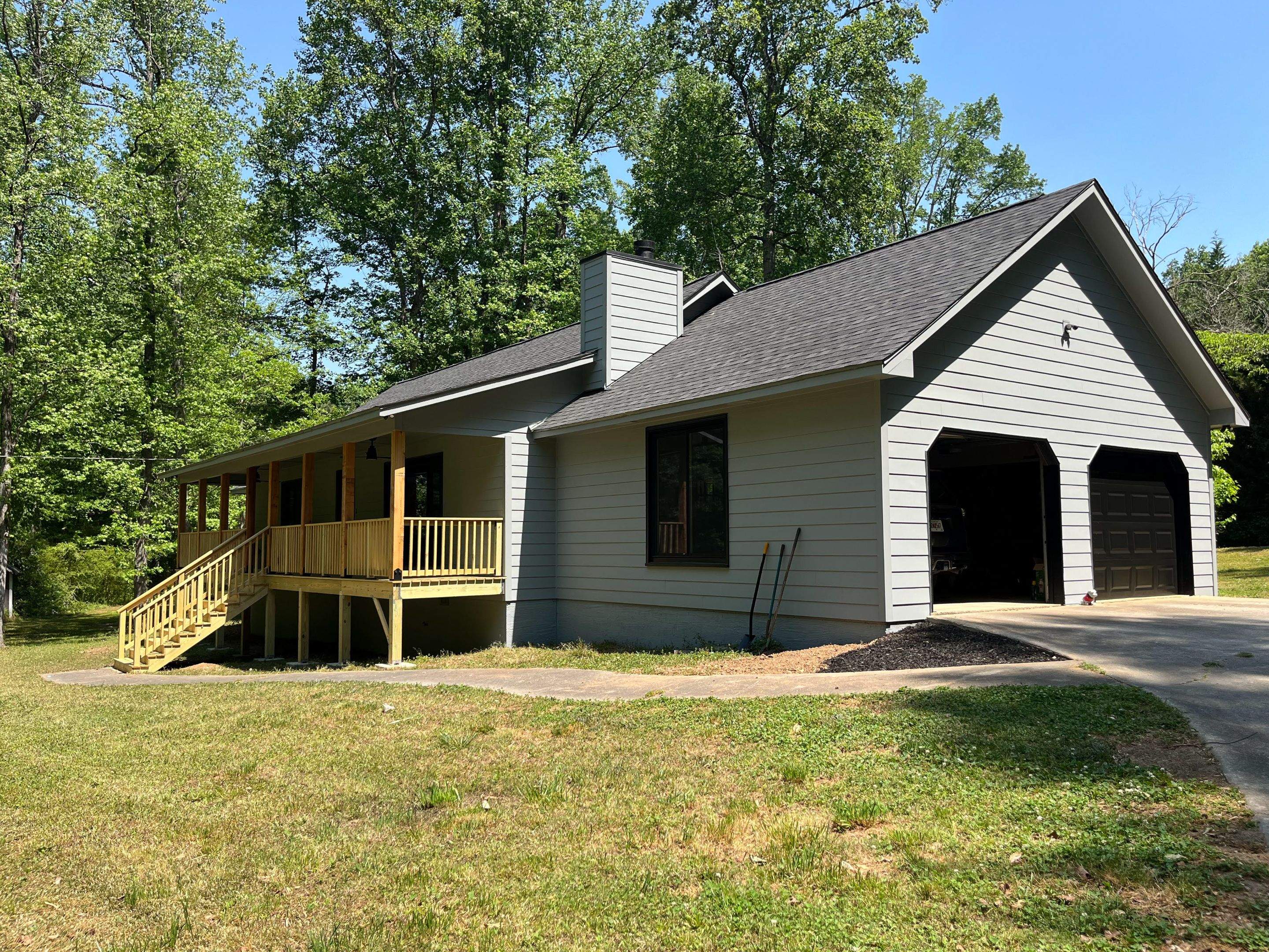 Smyrna, GA Full James Hardie Siding Replacement and Wood Front Porch Rebuild by Nelson Exteriors