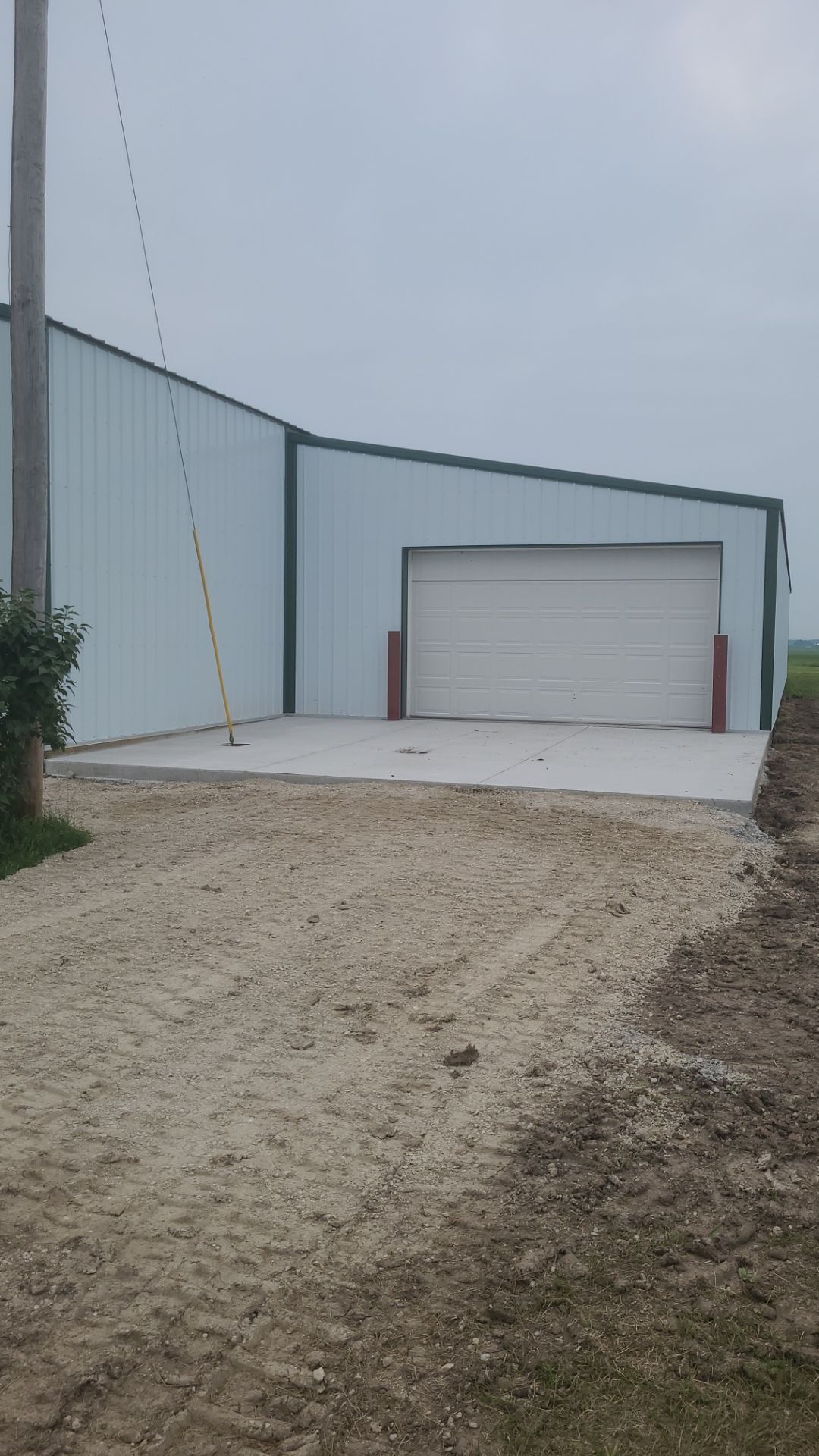 Reskin pole barn and add lean-to by Dagny Builders