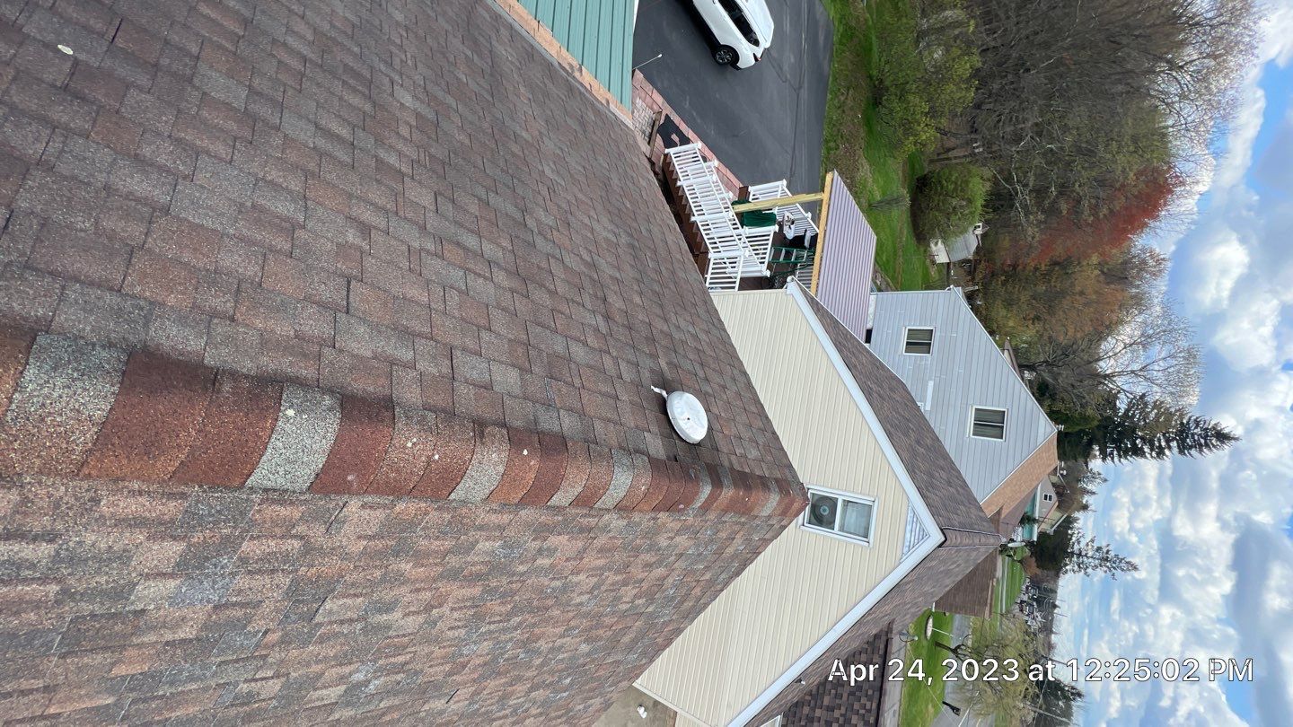 Estate Gray Shingles by Reimagine Roofing