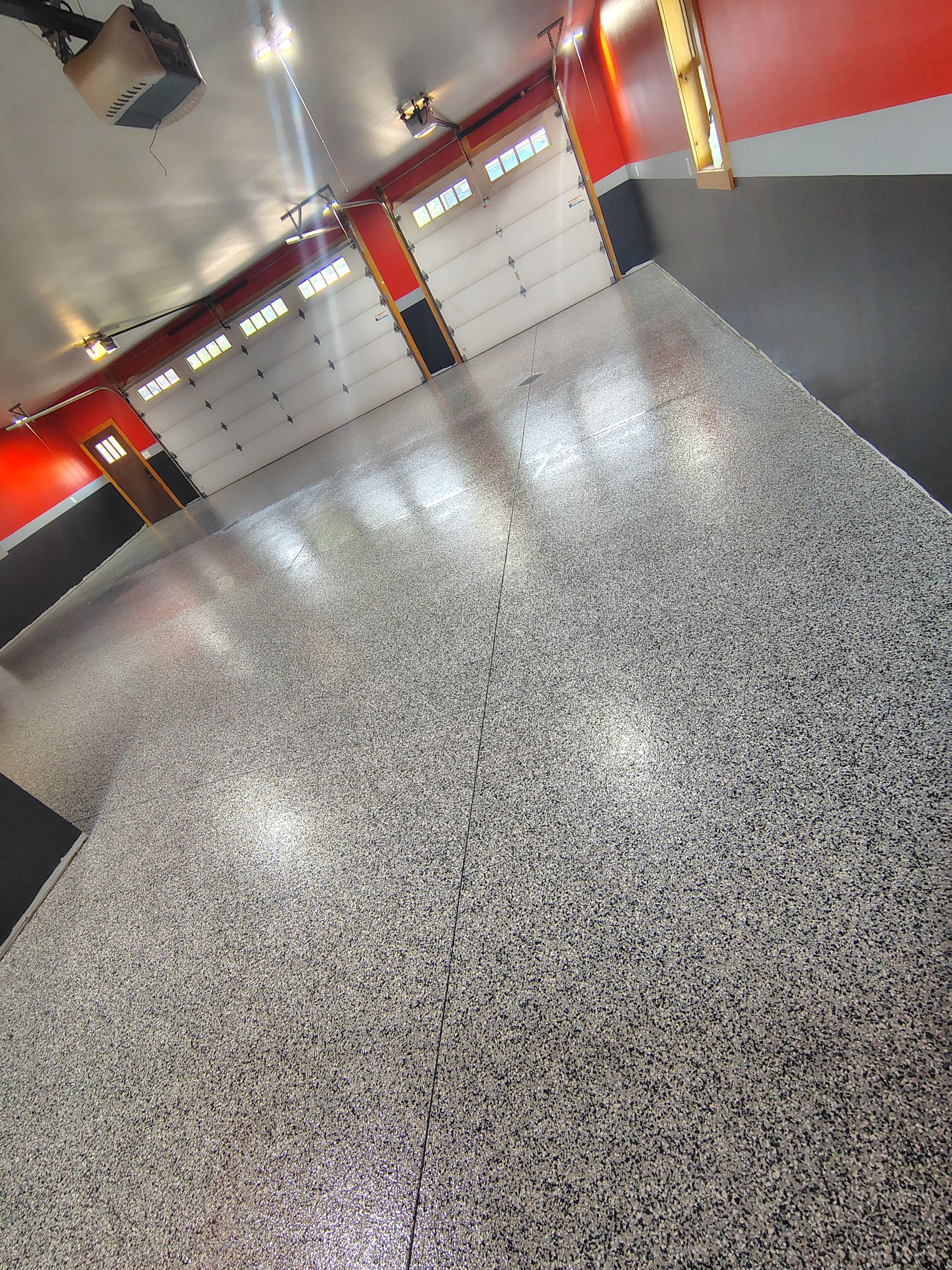 Multi-Car Garage Concrete Coating and Floor Refinishing in Hull by Select Painting, Coatings & Garage Cabinets