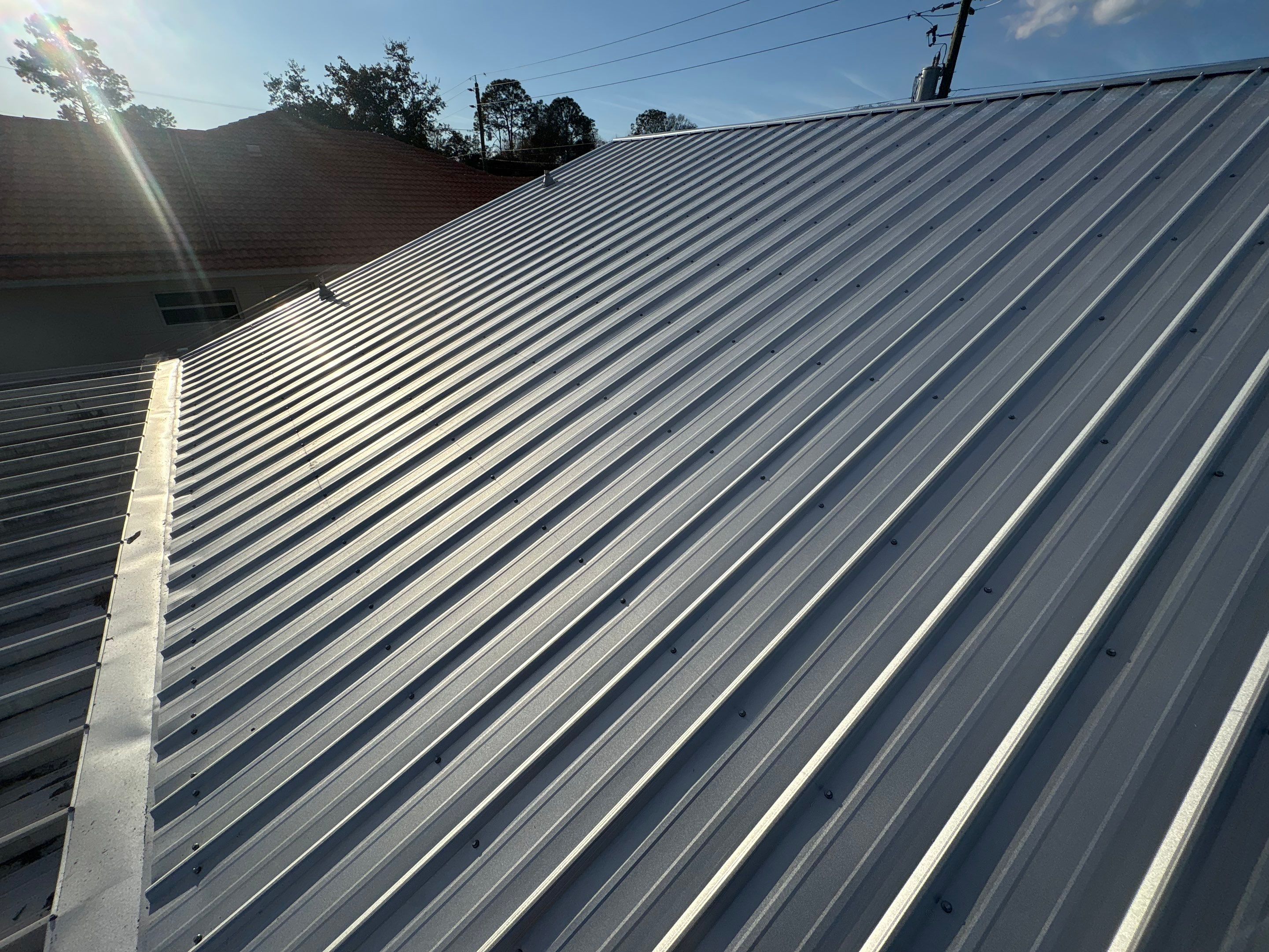 Metal Reroof Replacement Palm coast FL by Pinnacle Roofing Group