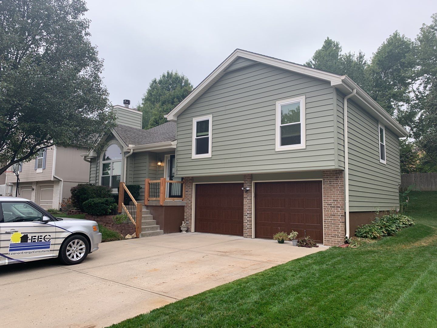 Siding Installation using Heartland Patio Door by EEC  Windows, Siding & Roofing 