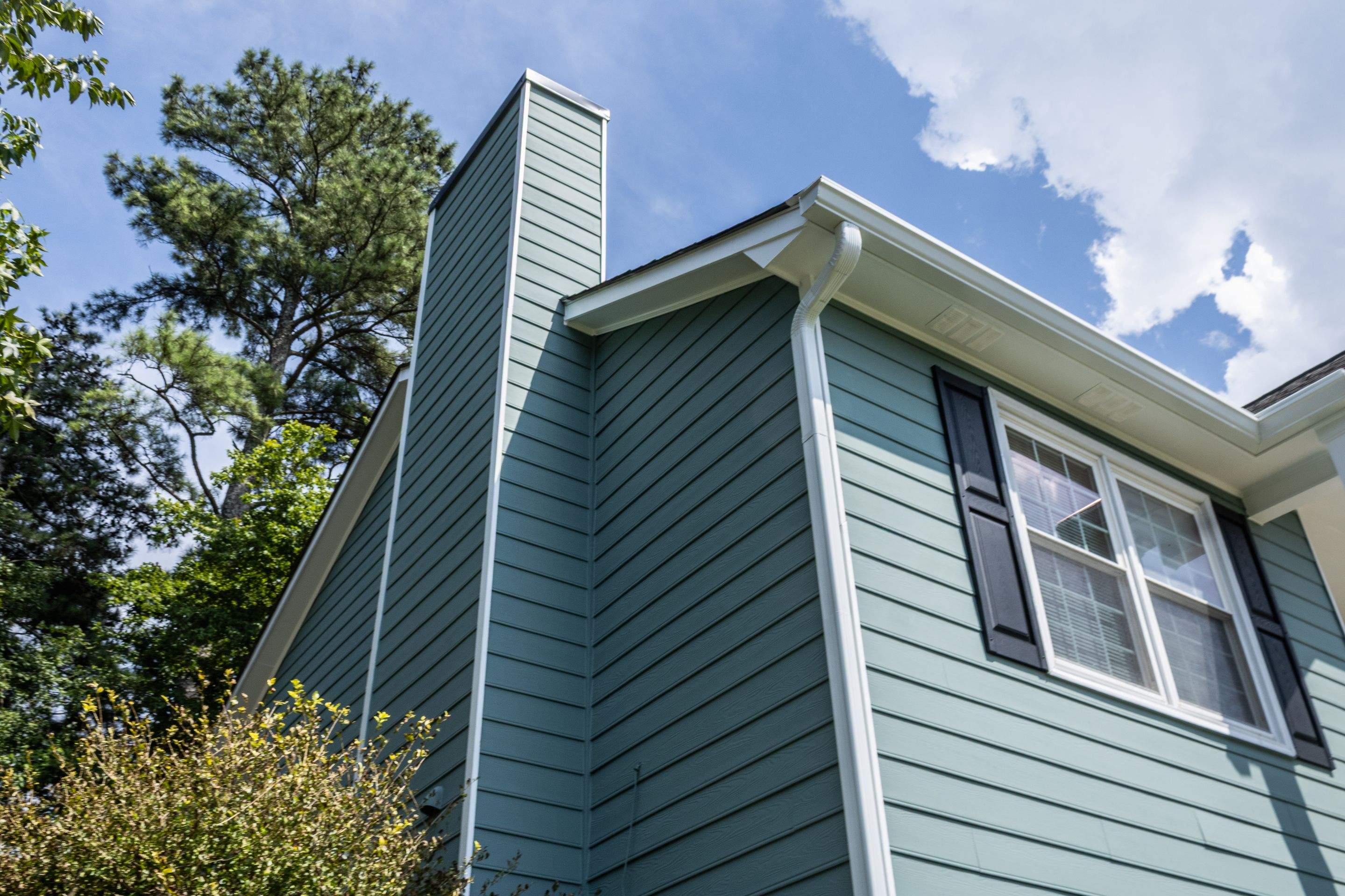 Alpharetta, GA Partial Siding Replacement, Porch Stain, and Exterior Painting by Nelson Exteriors 