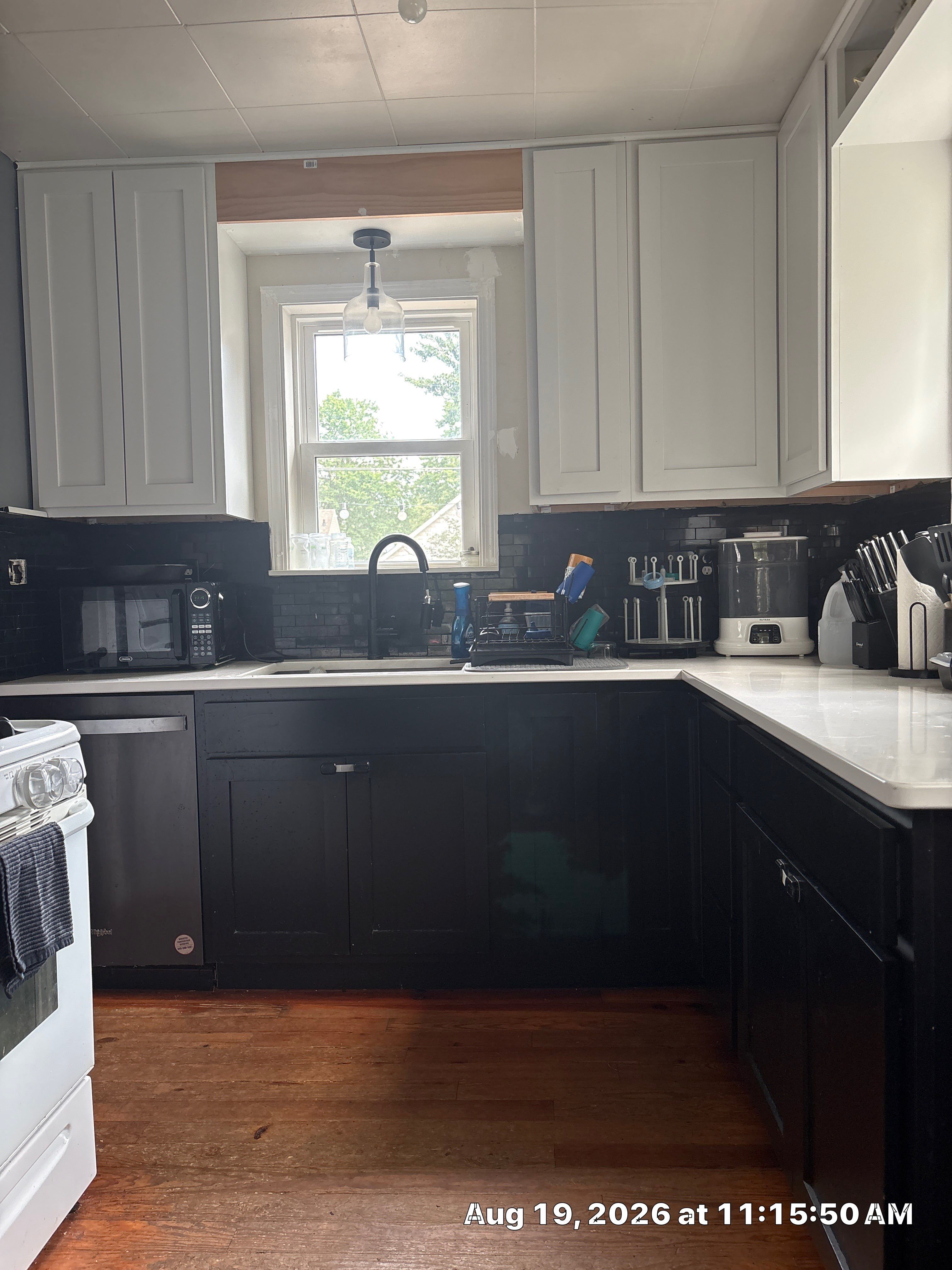 Modern Two-Tone Kitchen Remodel with Quartz Countertops in Lincoln by CompanyCam Sales Demo