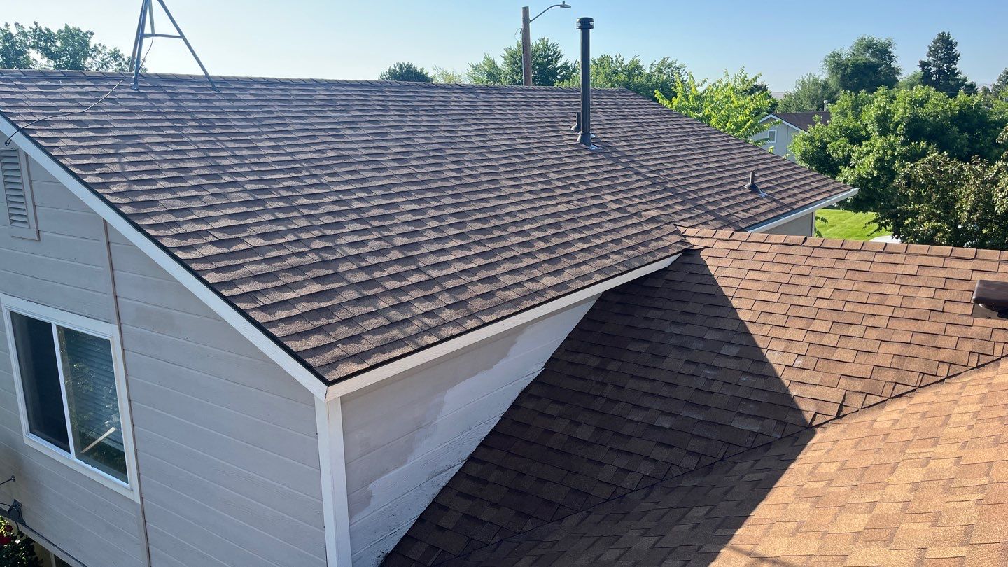 Stunning Roof Transformation in Mountain Home with Desert Tan Shingles by ID Roofing LLC