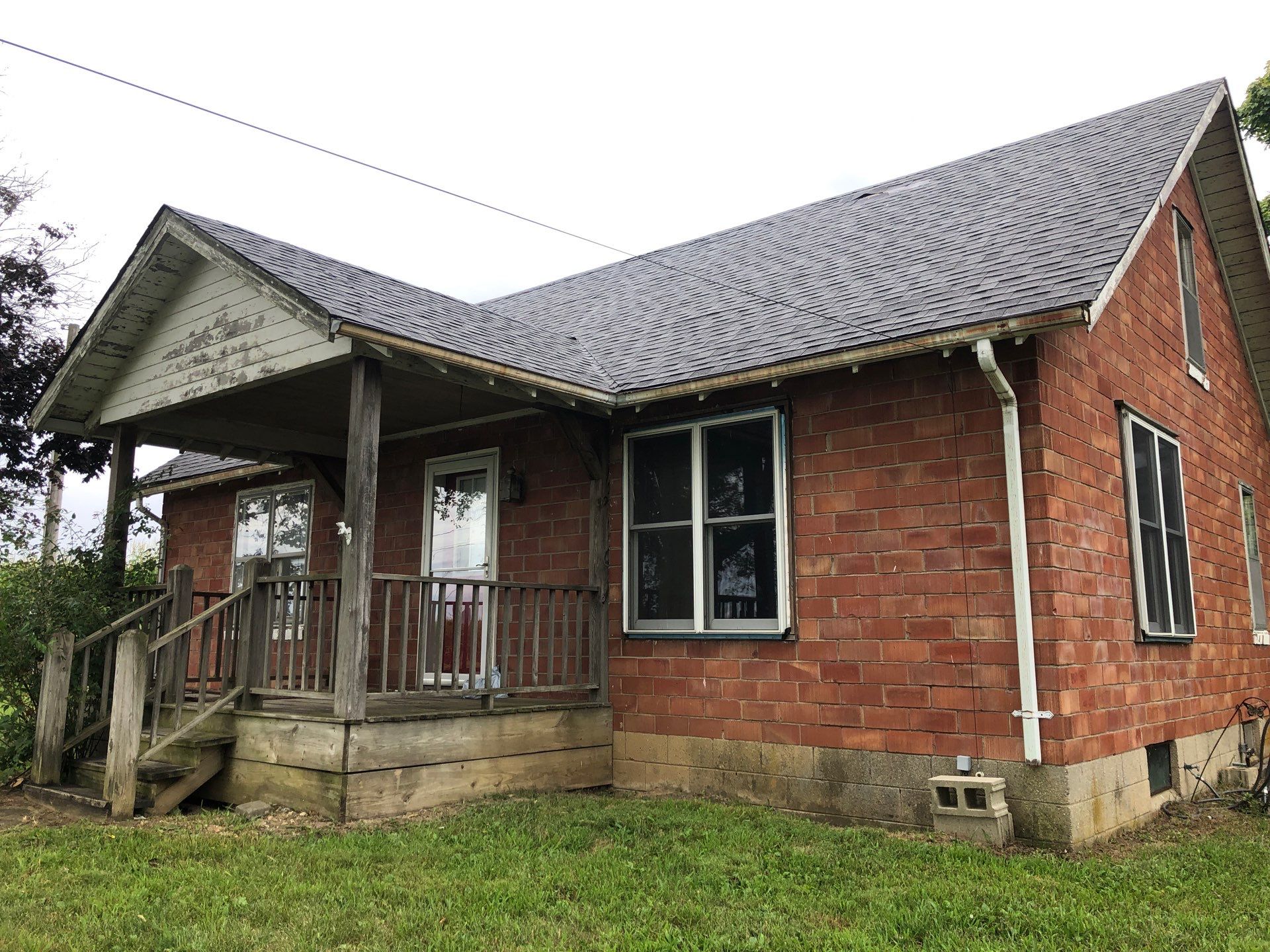 Old Farmhouse Restoration by 317 Roofing & Restorations