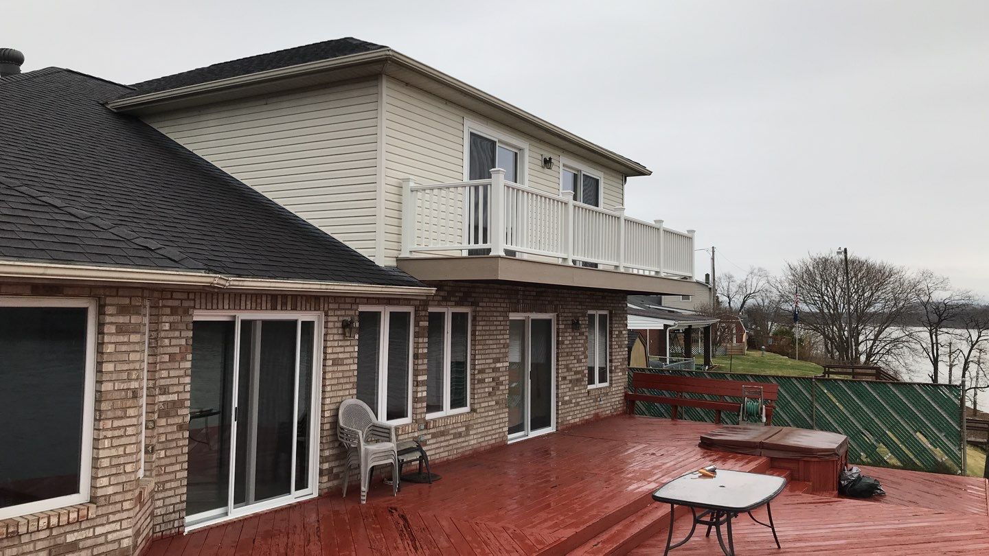 Deck Refurbush and Door Replacement using Trex Decking and Railing. Polaris Patio Doors by Secure Construction Company Inc