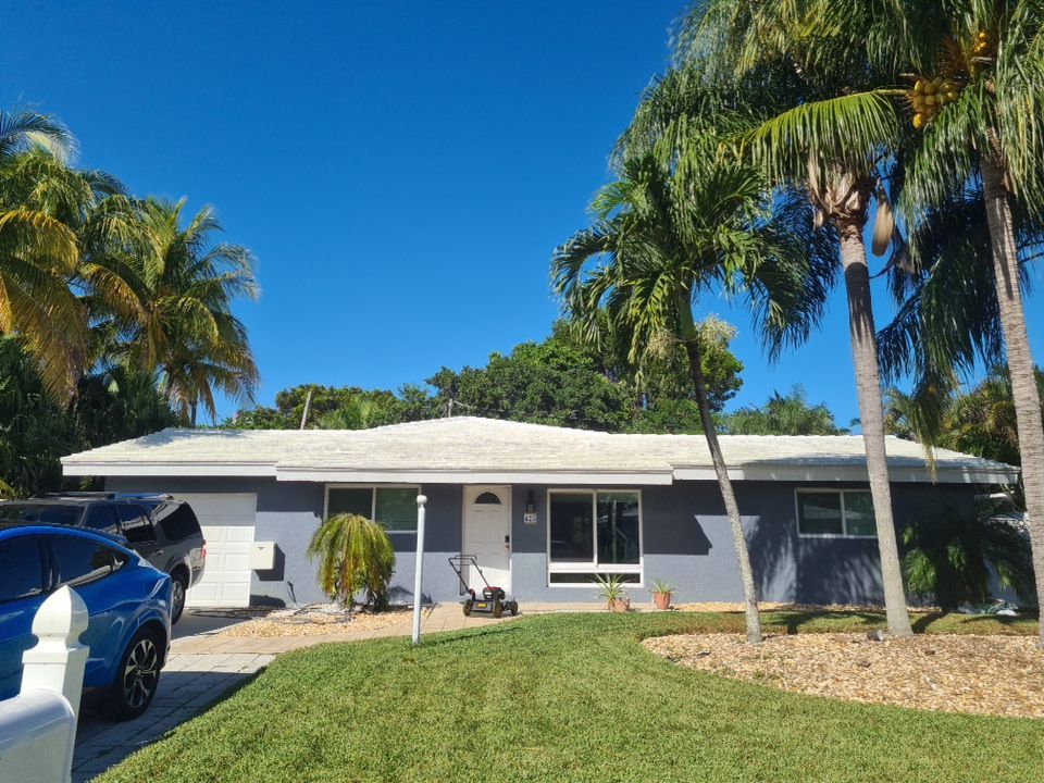 Residential Roofing Installation using 1" Nail strip metal roof by BLUES BROTHERS CONSTRUCTION CORP