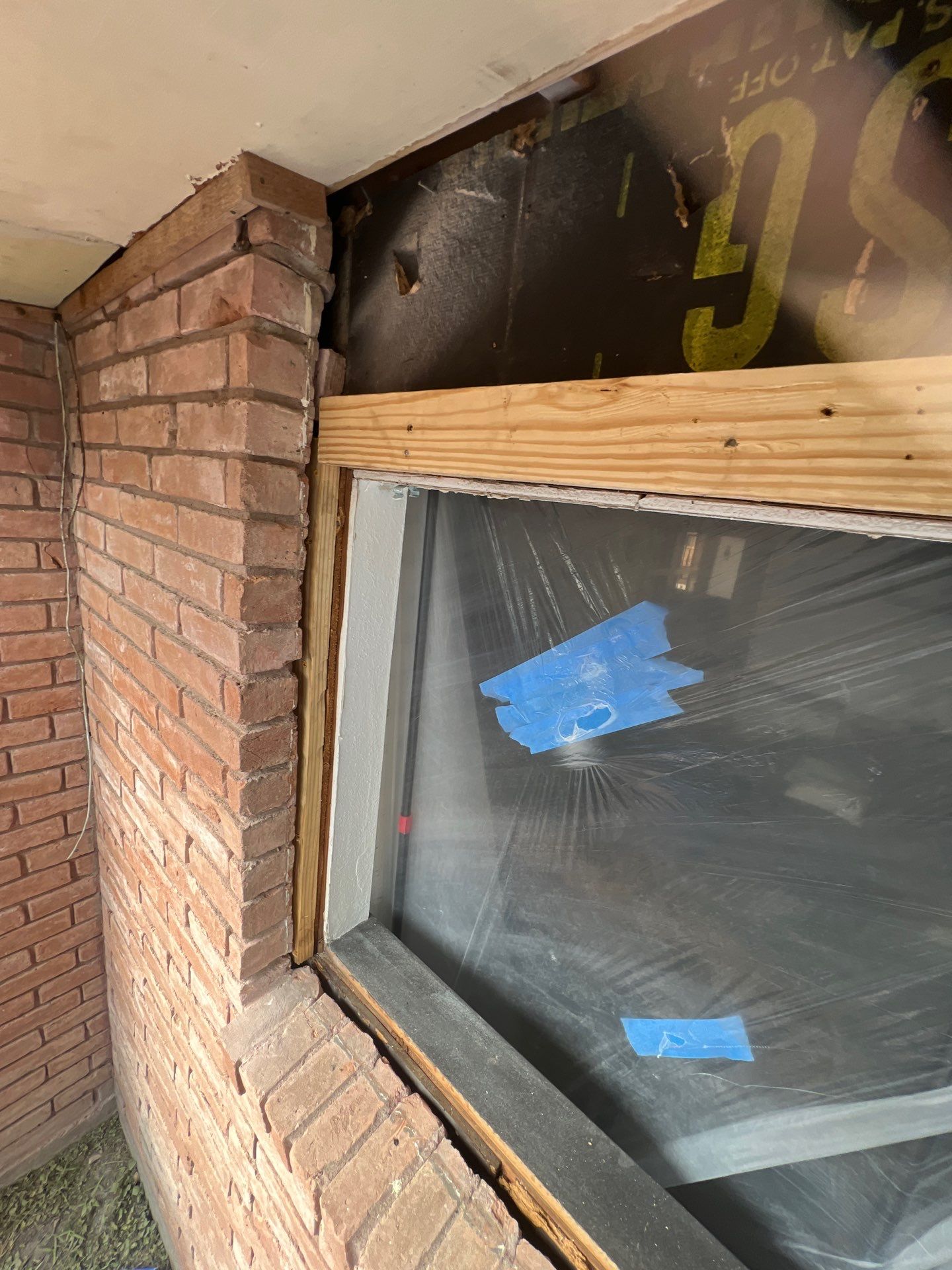 Windows in Brick with a Bay Window by Bayfront Roofing and Construction