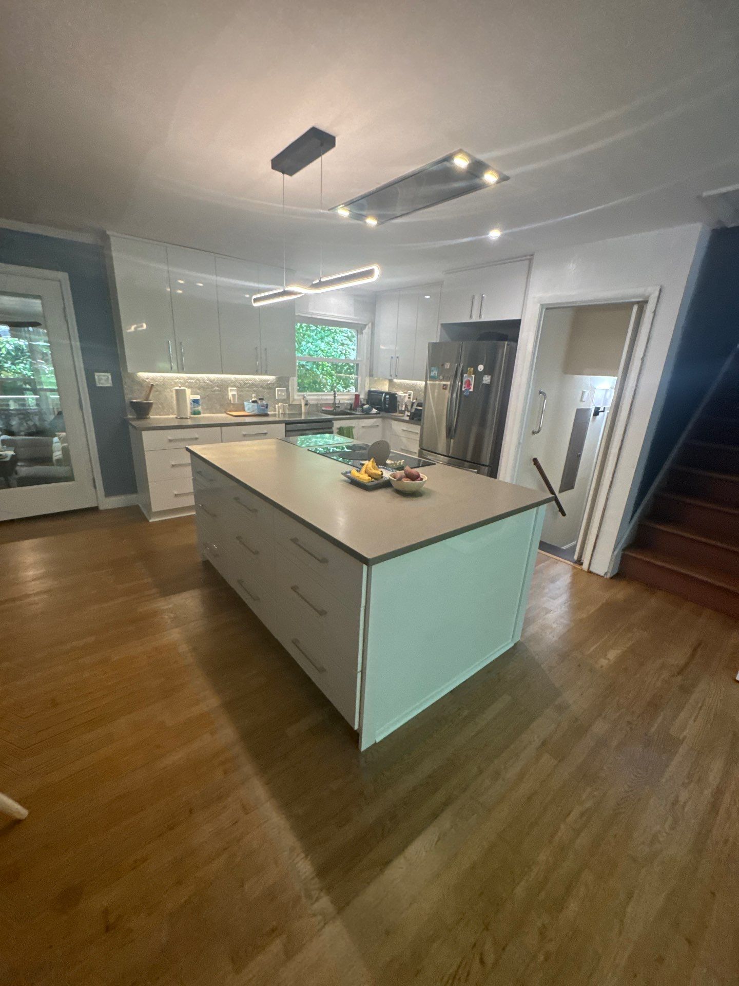 Modern Kitchen Remodeling with Large Central Island in Doraville by Swift Home Renovations