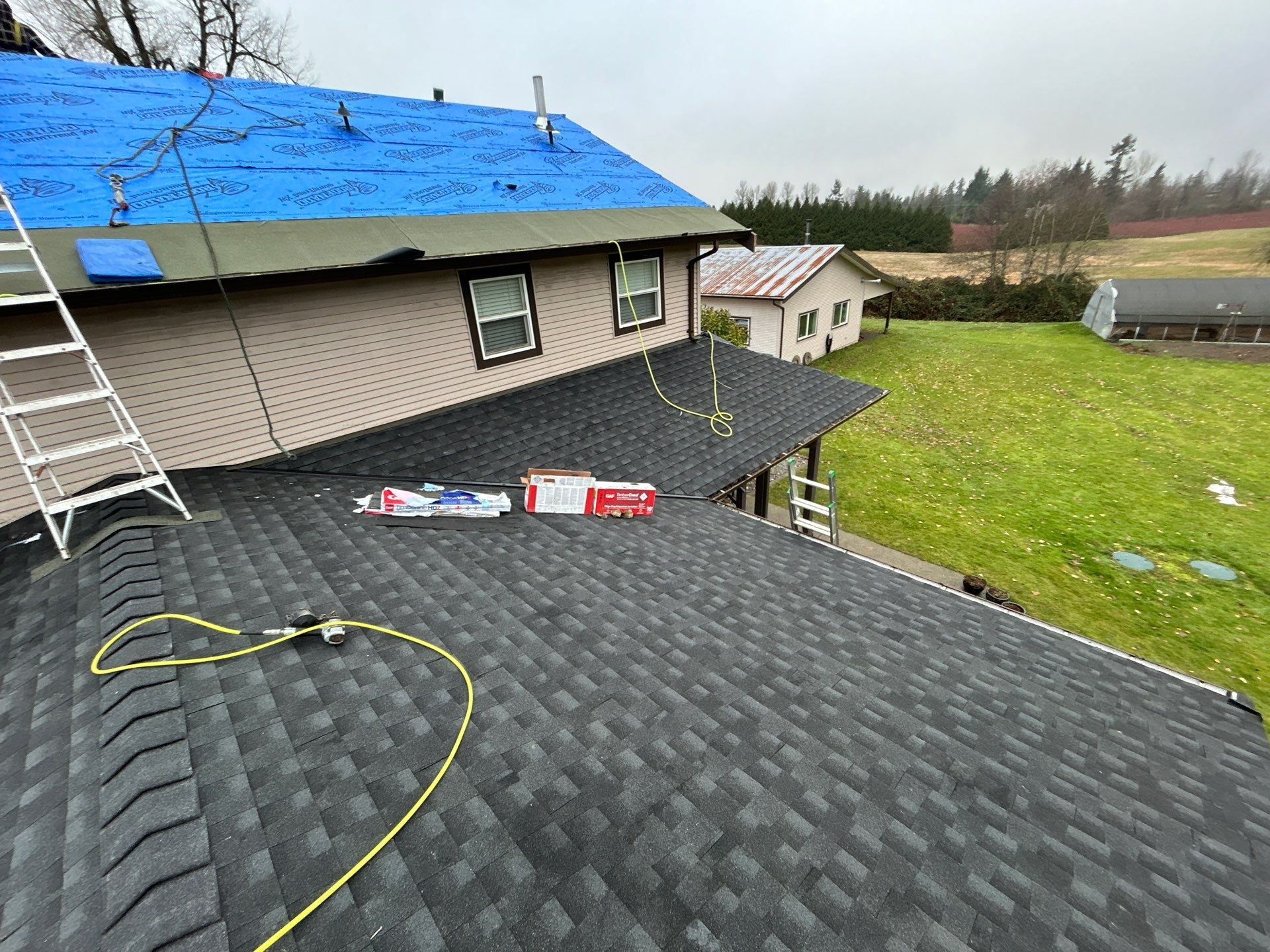 Residential Roofing Installation using GAF Charcoal HDZ by Top Notch Roofing Inc