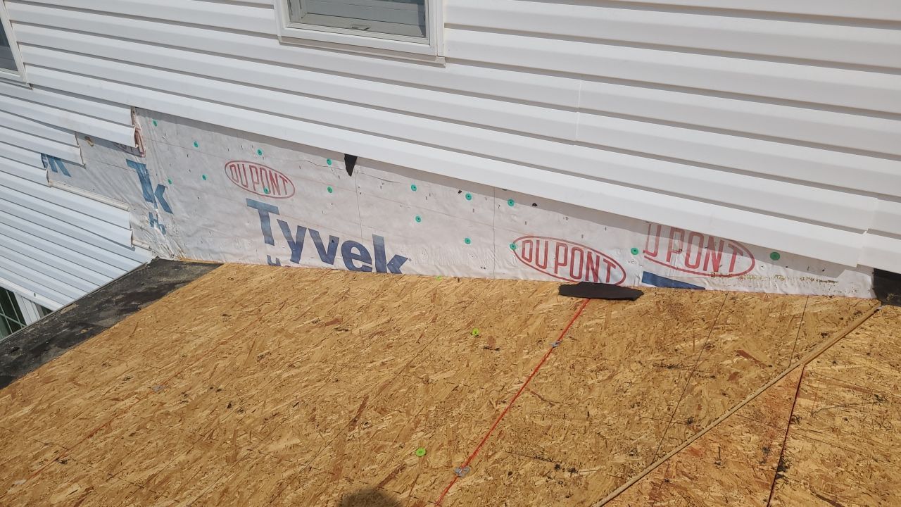 Roof Damage using Certainteed Lifetime Roofing System- Moire Black Landmark Pro shingkes with shadow ridge caps. by BulletpROOF Exteriors