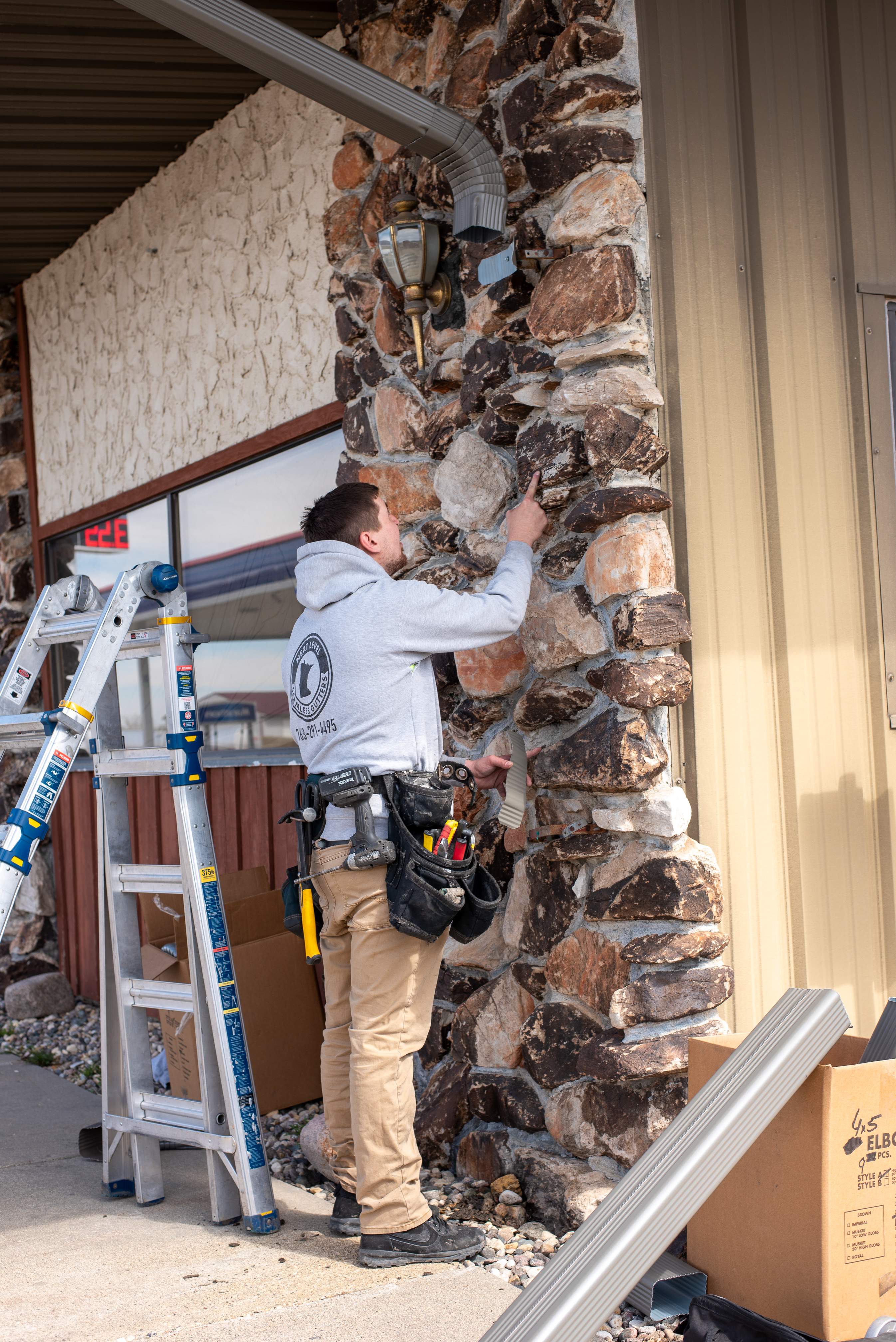 Commercial Gutter Repair in New London MN | Reseaming Gutters & New Downspouts by Next Level Seamless Gutters / Exteriors Inc.